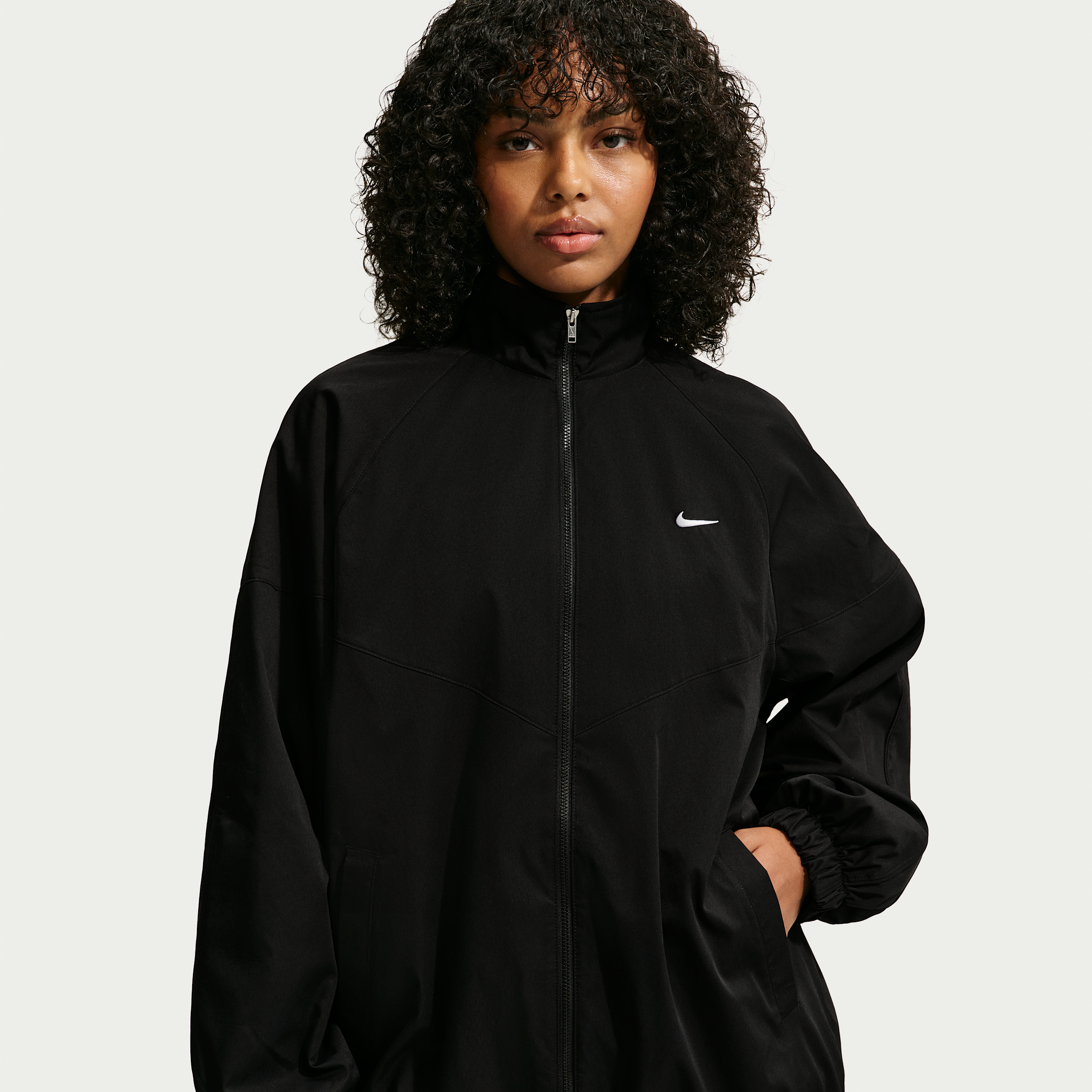 Women's Nike Sportswear Oversized Track Jacket in Black | IQ3164-010
