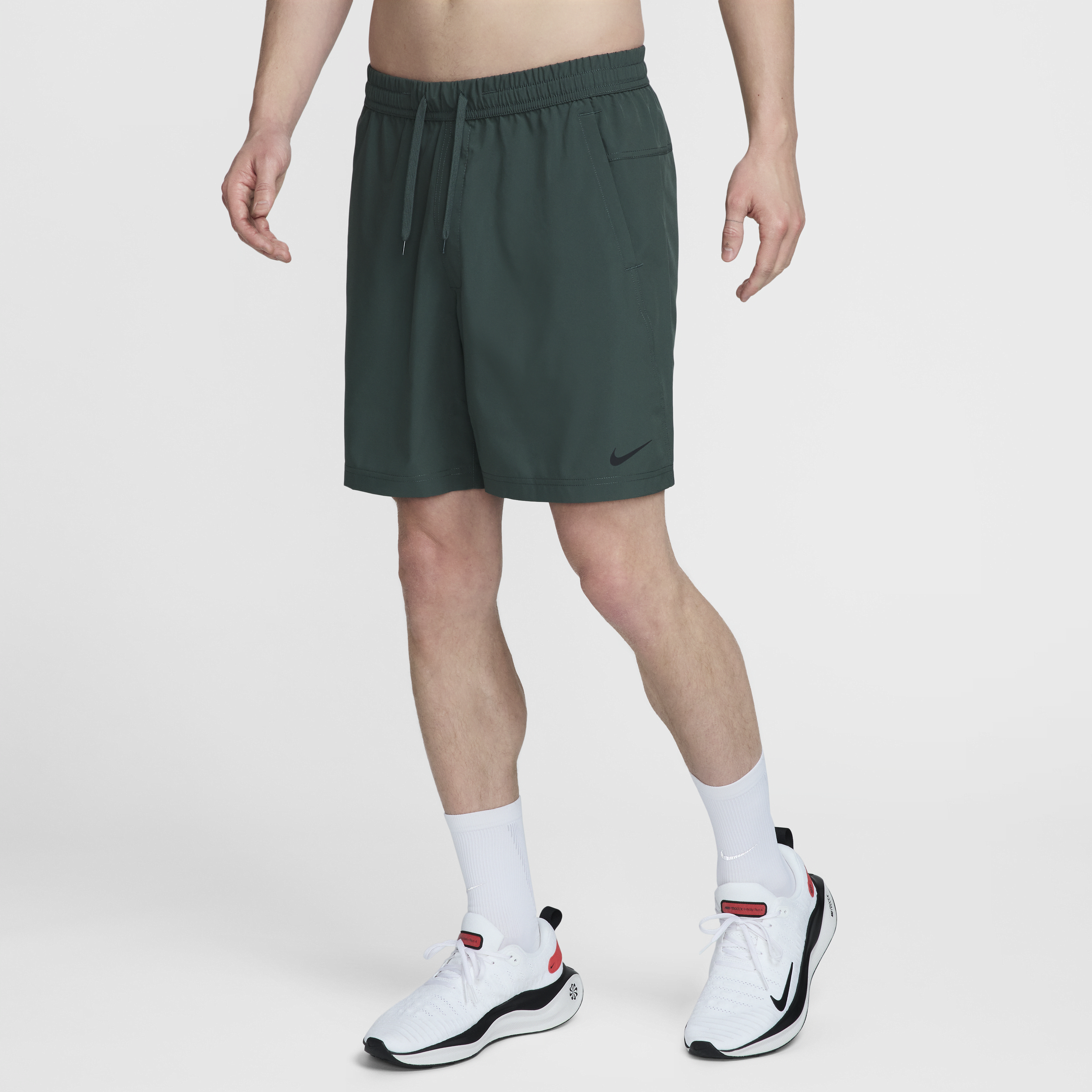 Shop Nike Men's Form Dri-fit 7" Unlined Versatile Shorts In Green