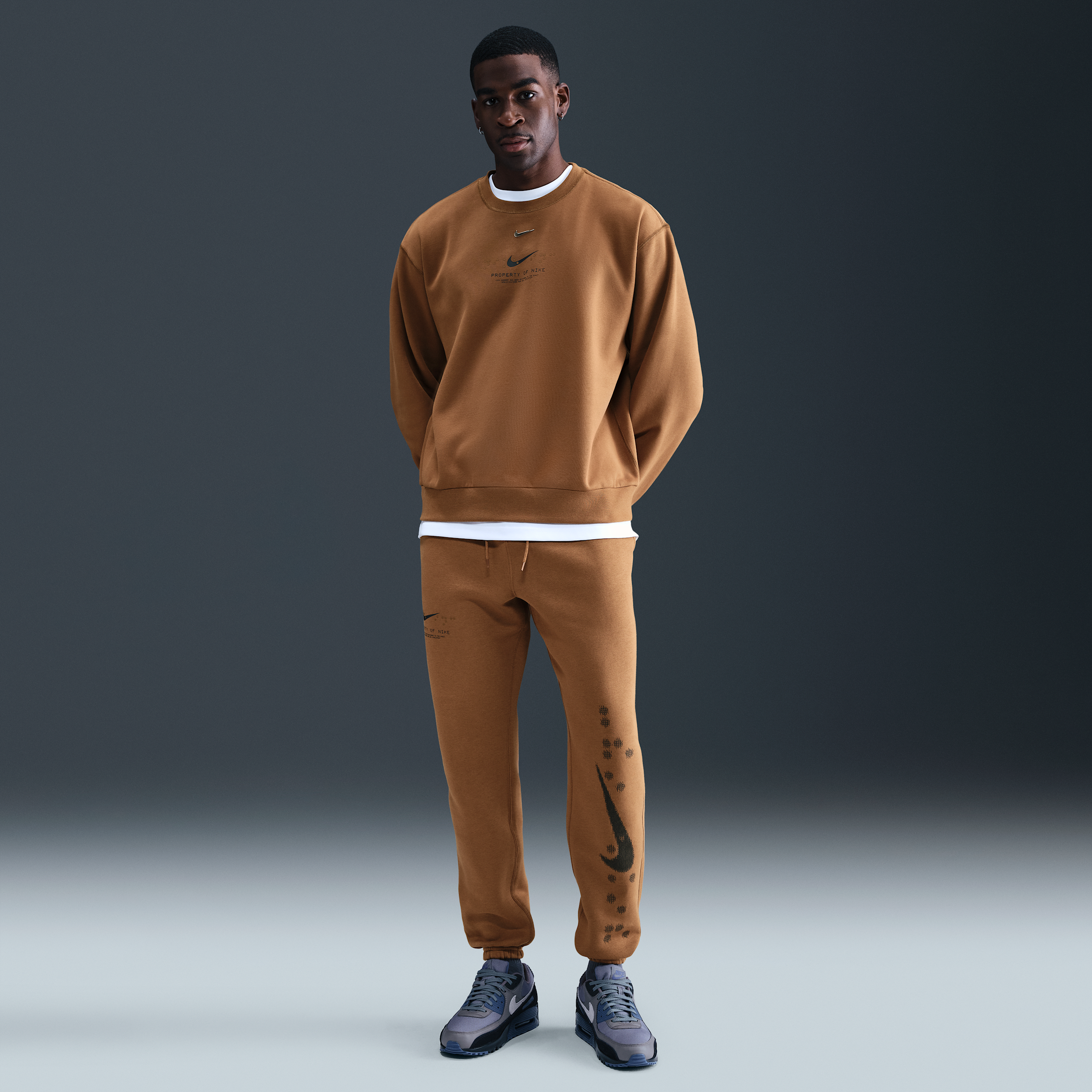 Men's Nike Sportswear Club Cuffed Fleece Pants in Brown | IM7828-235
