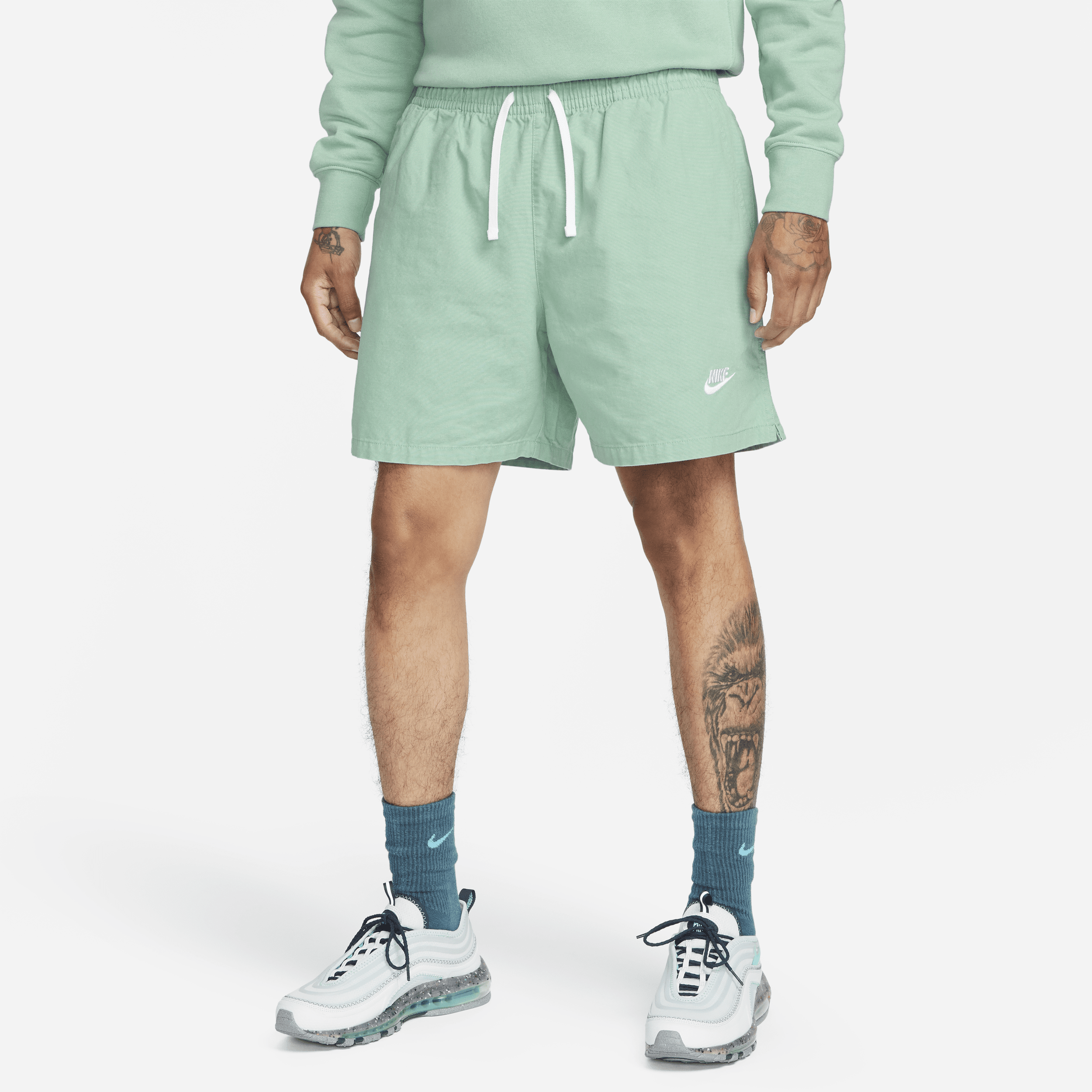 Nike Men's Club Woven Washed Flow Shorts In Green
