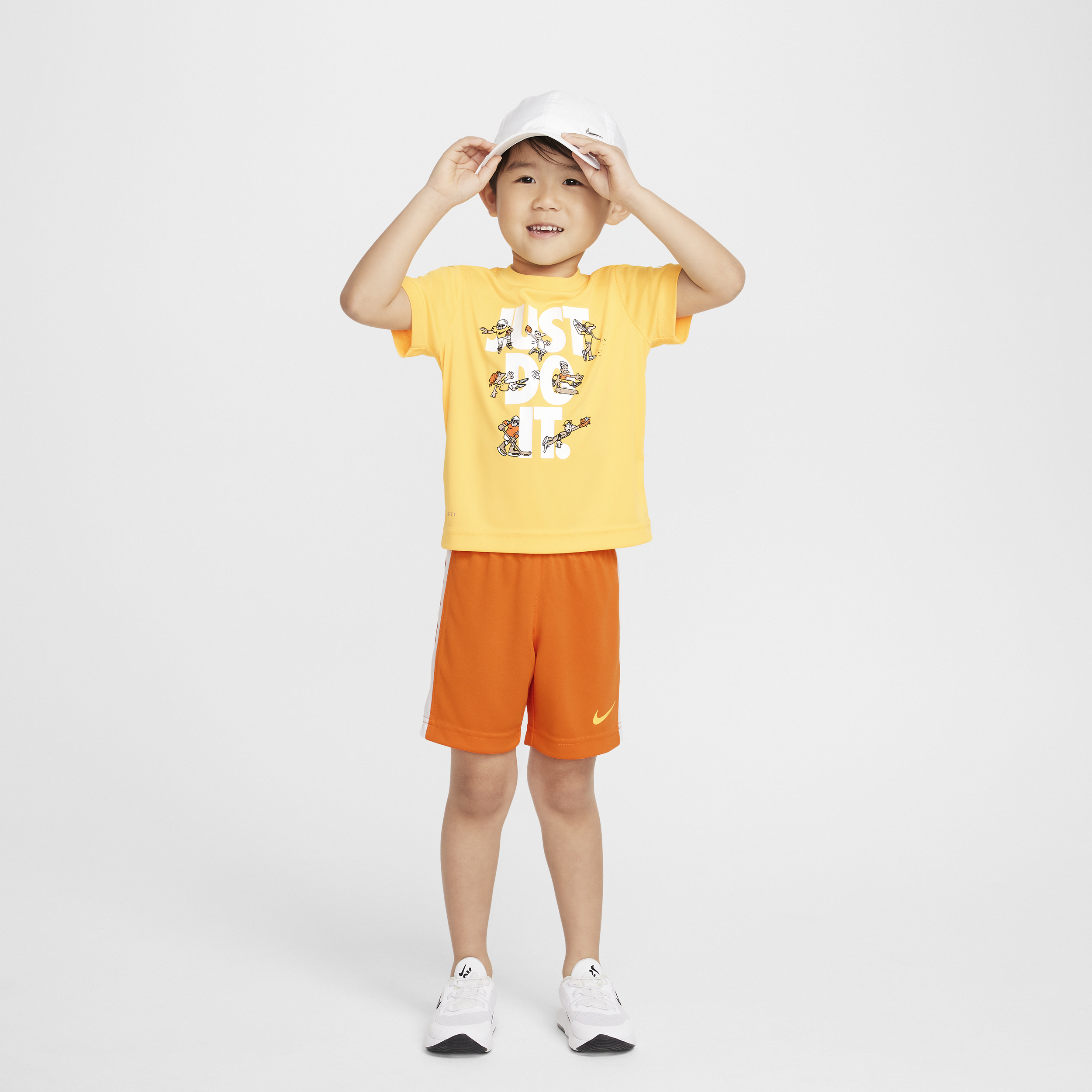 Shop Nike Dri-fit Toddler Shorts Set In Orange