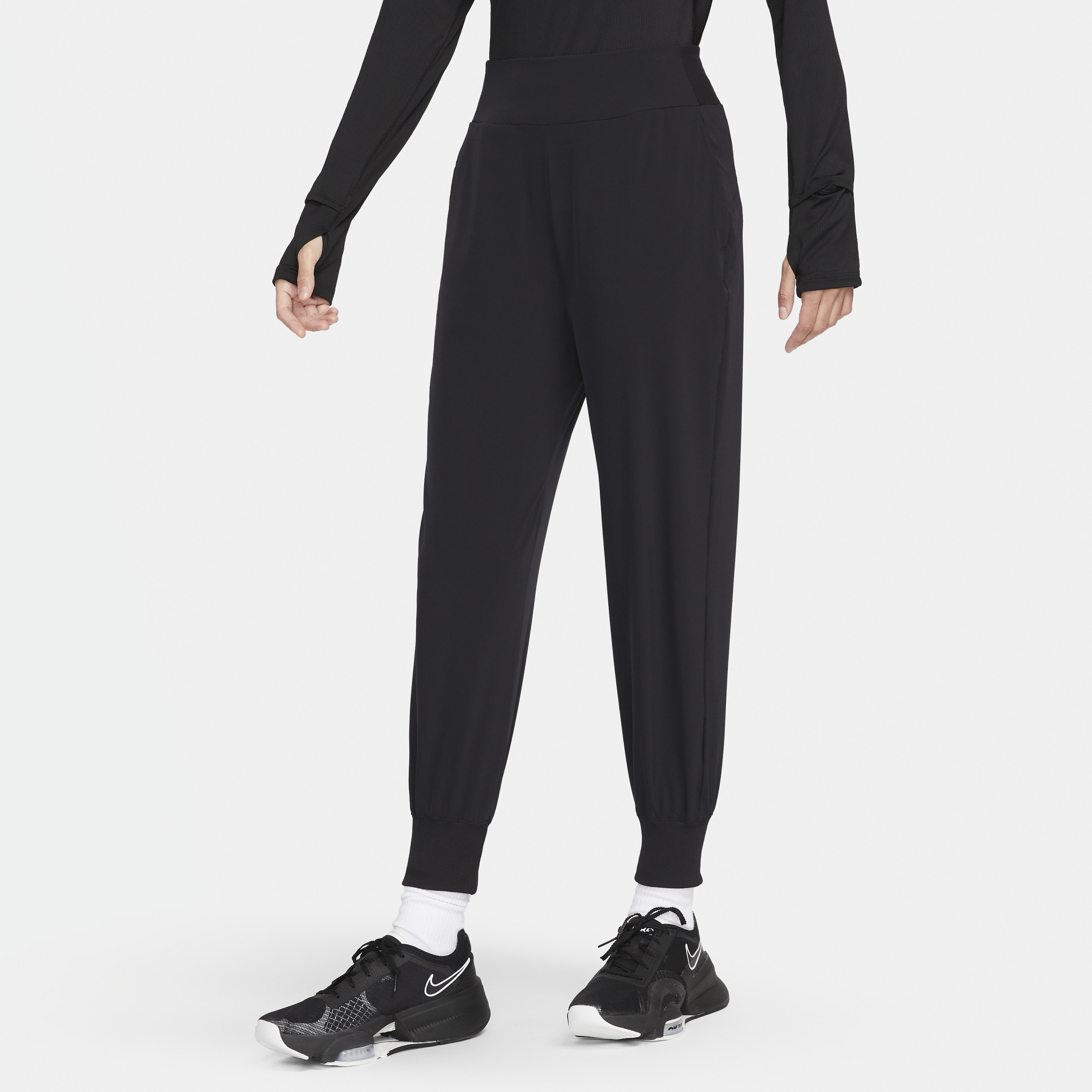 Shop Nike Women's Dri-fit Bliss Mid-rise 7/8 Jogger Pants In Black