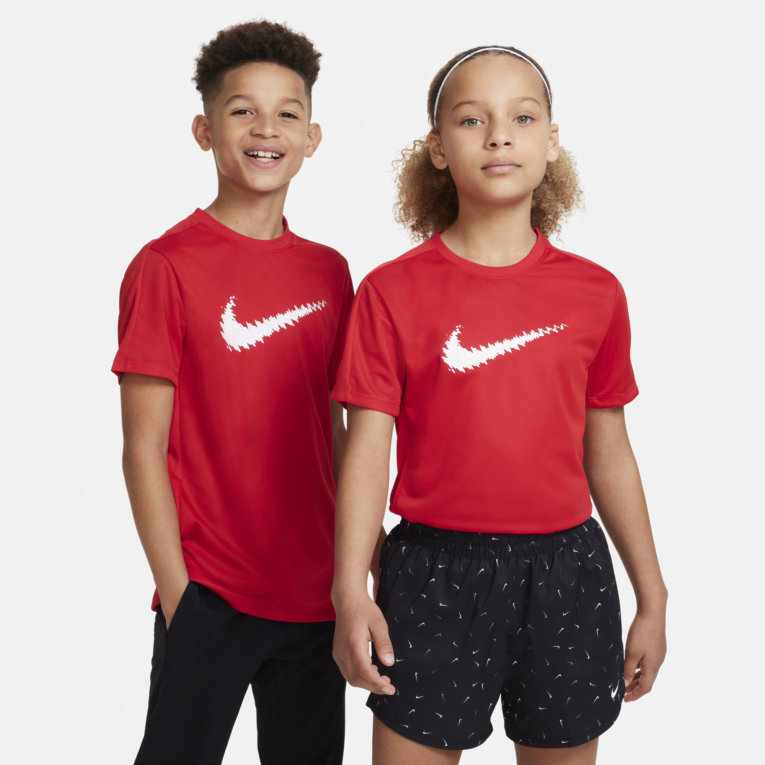 Nike Dri-fit Trophy Big Kids' Graphic Short-sleeve Training Top In Red