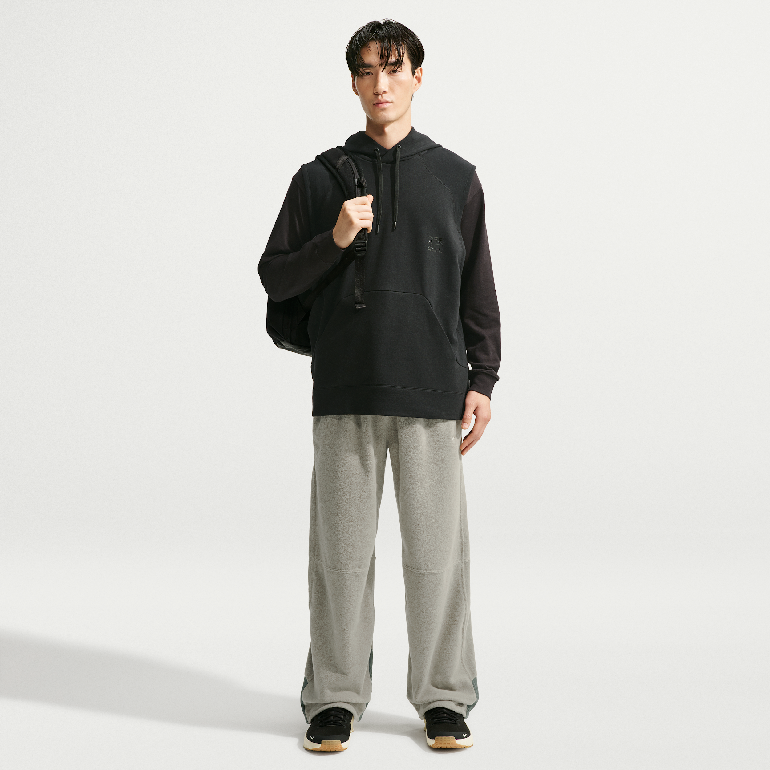 Nike Men's Therma-FIT Versatile Pants in Green | IX7293-320