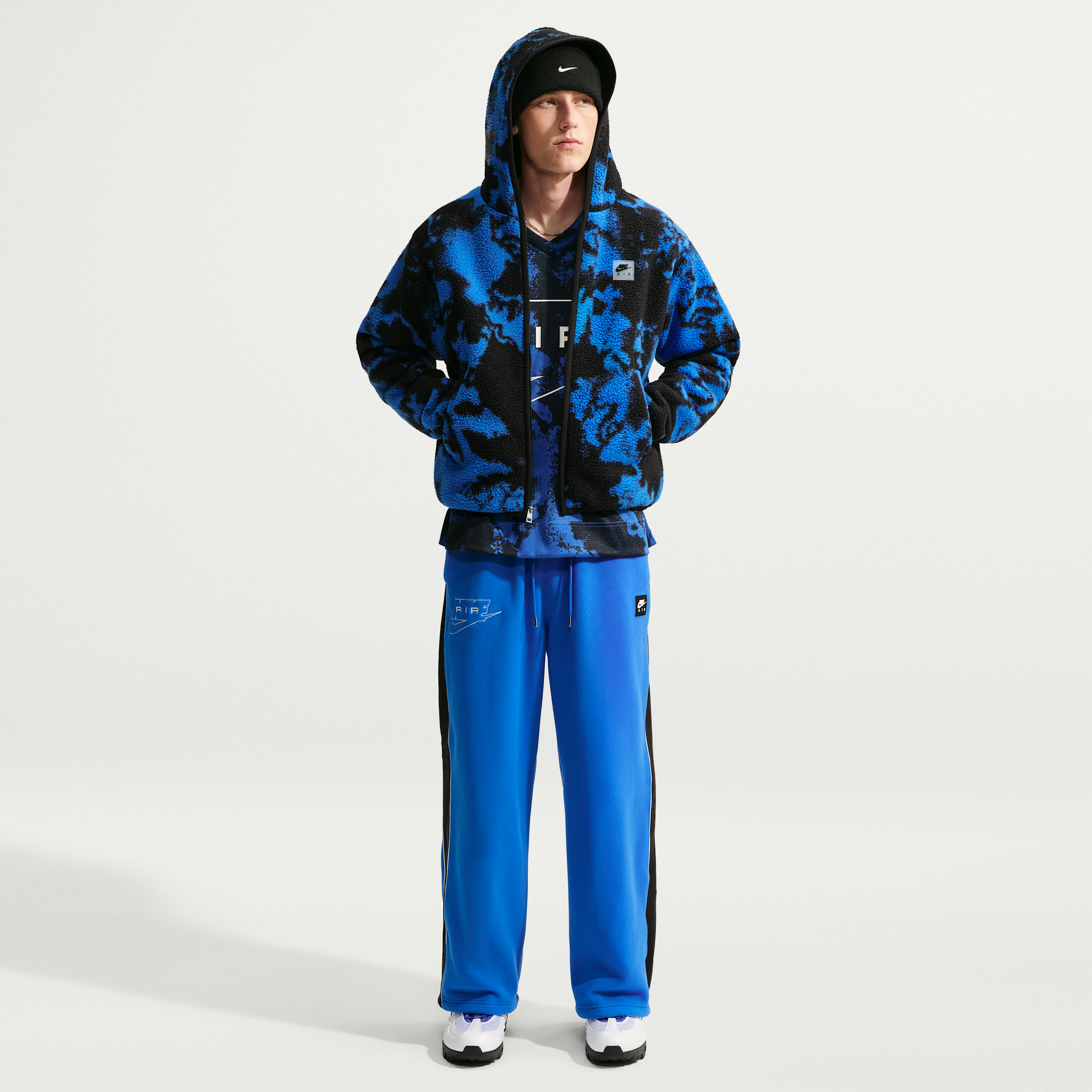 Nike Men's Air Polartec® Therma-FIT Open-Hem Pants in Blue | IQ6511-405