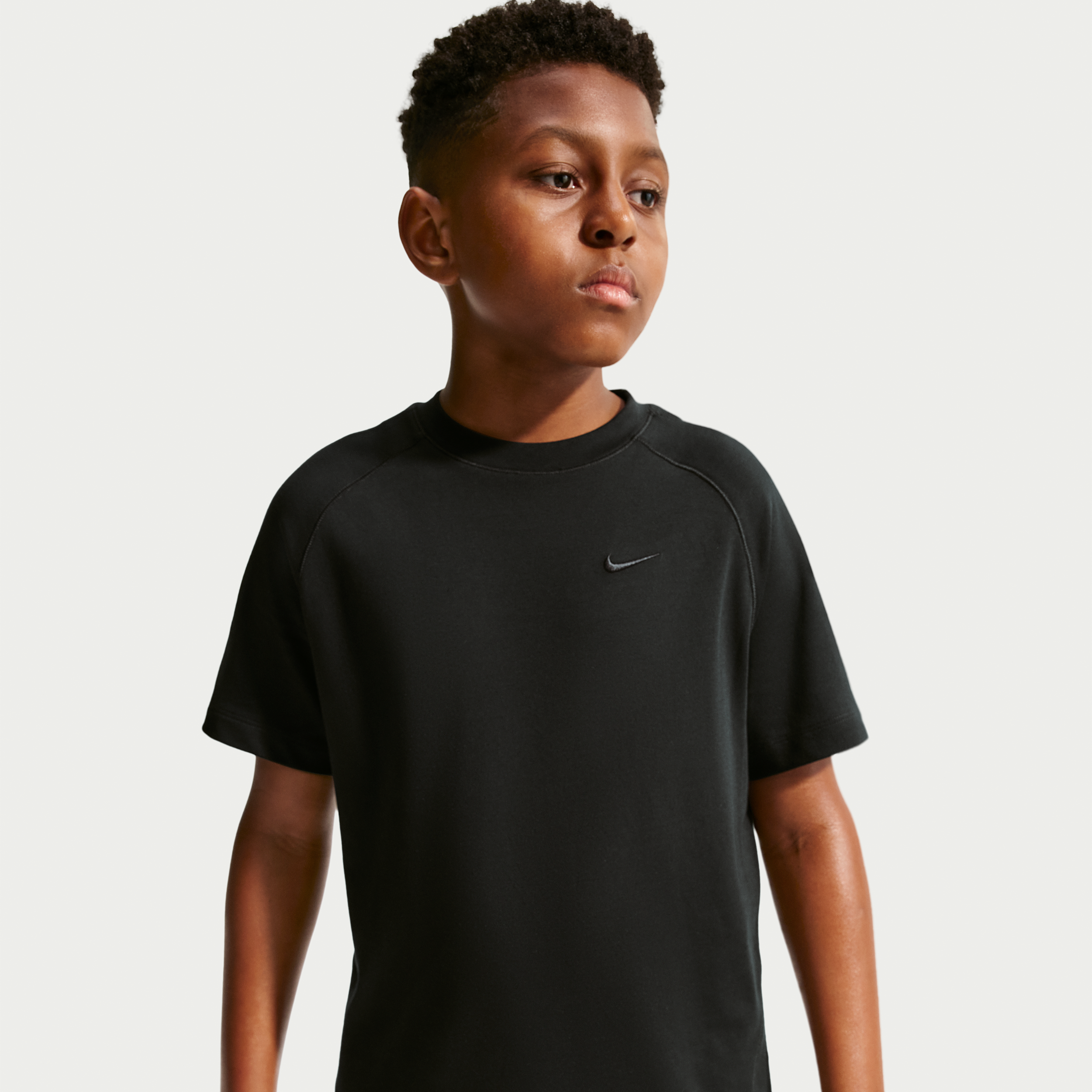 Nike Primary Big Kids' Dri-FIT Top in Black | IU3225-010