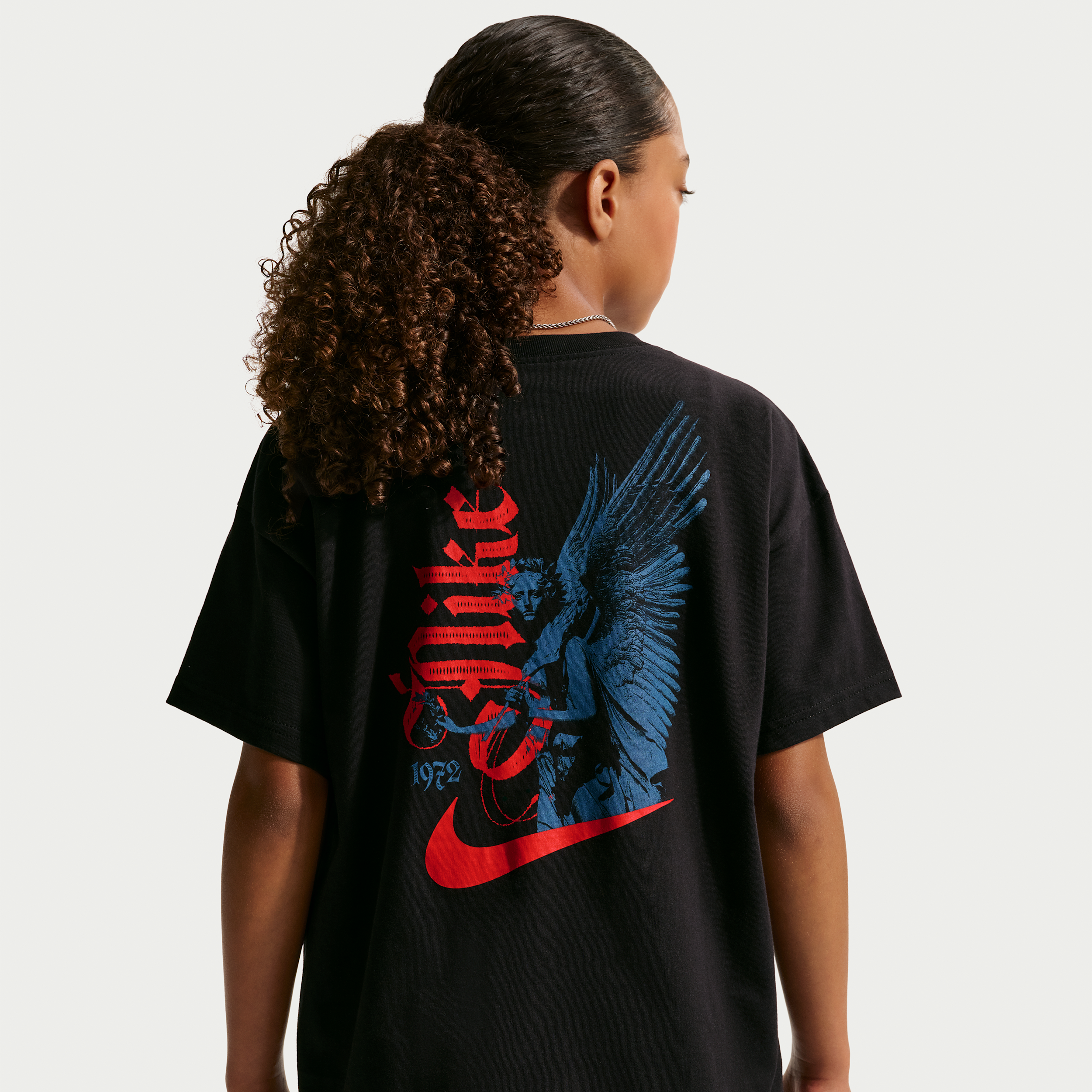 Nike Sportswear Big Kids' T-Shirt in Black | JF8507-010
