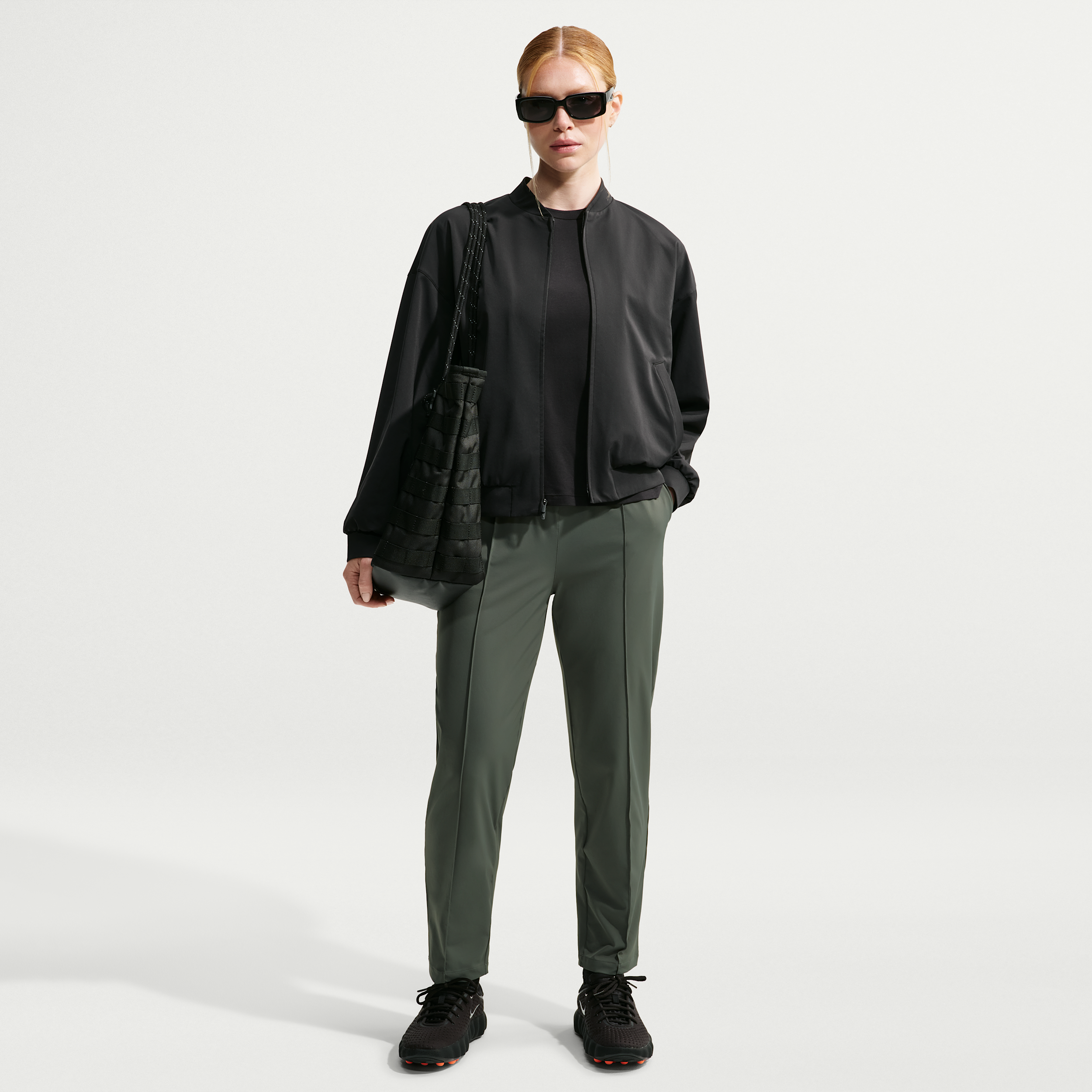 Nike Women's 24.7 PerfectStretch Dri-FIT UV Protection High-Rise Tapered Pants in Green | HM8844-303