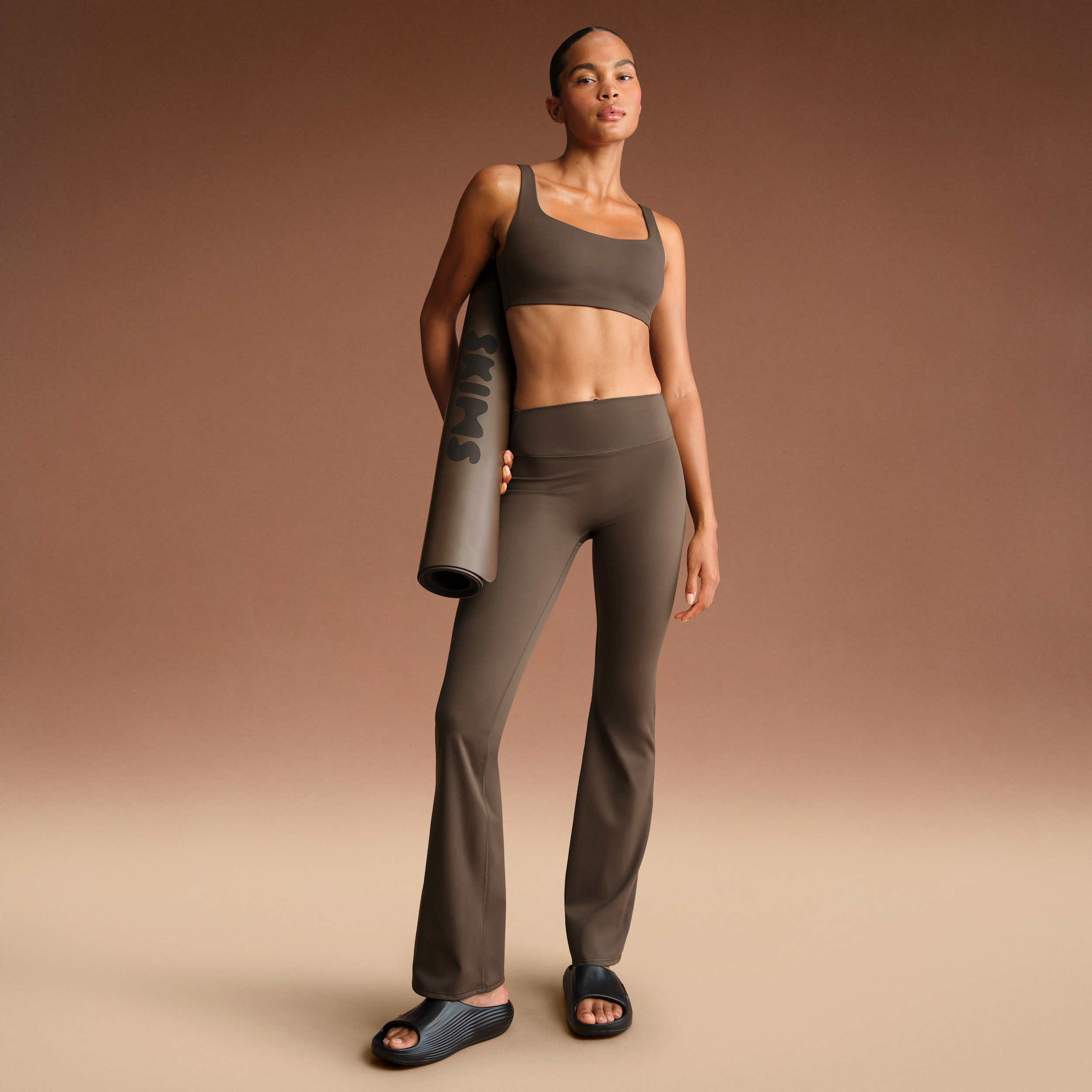 Nike Women'sskims Matte High-waisted Slim Flared Leggings In Brown