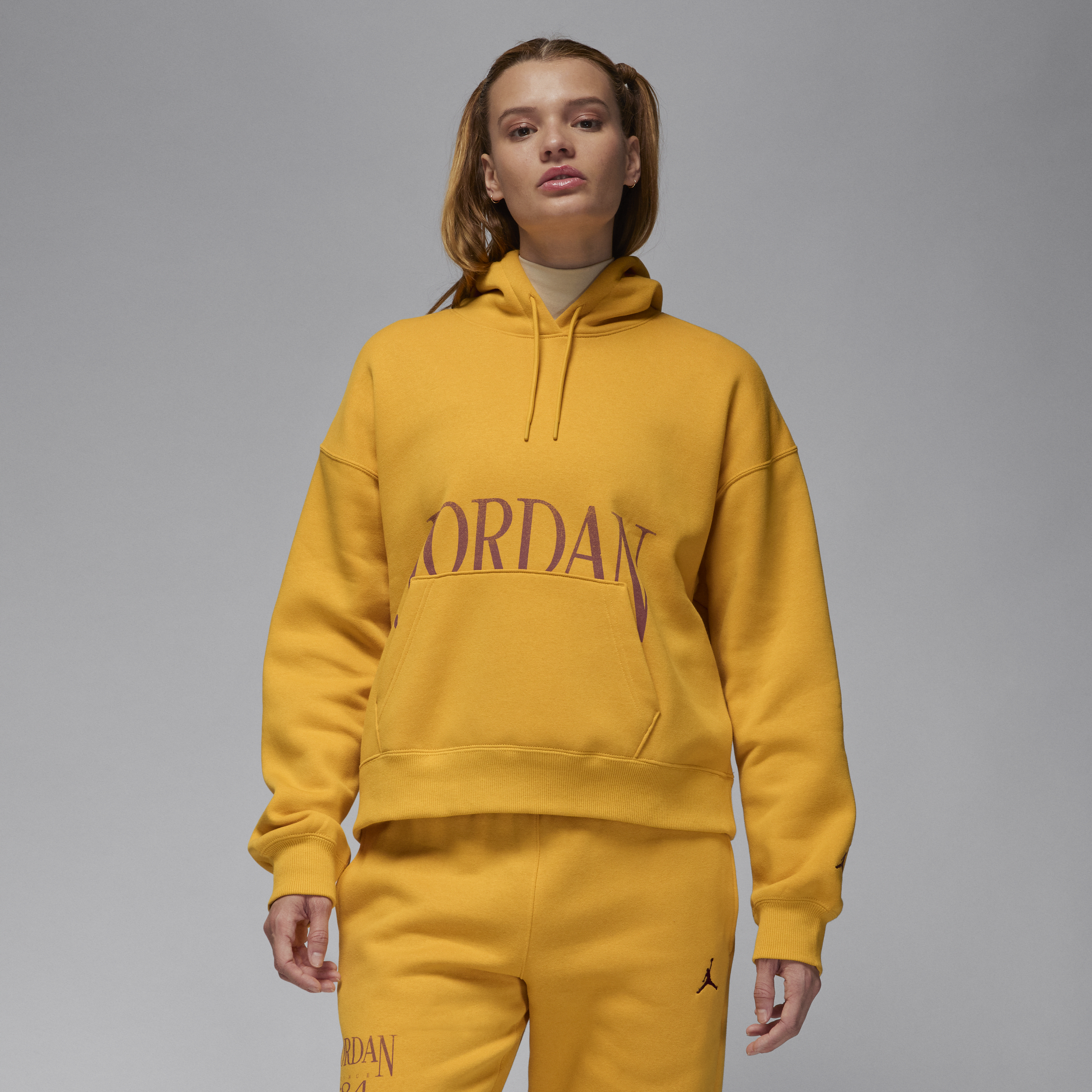 Shop Jordan Women's  Brooklyn Fleece Pullover Hoodie In Yellow