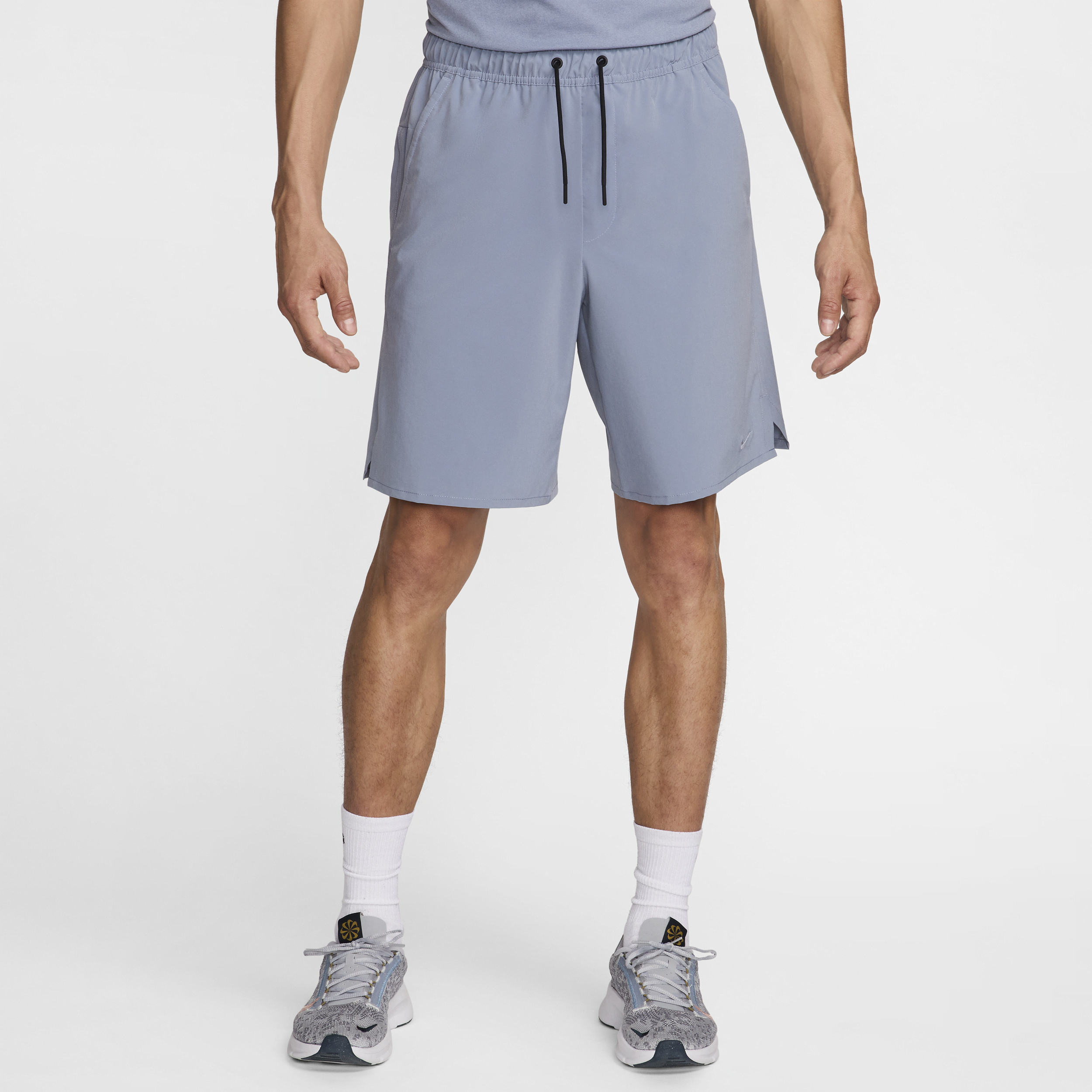 Shop Nike Men's Unlimited Dri-fit 9" Unlined Versatile Shorts In Blue