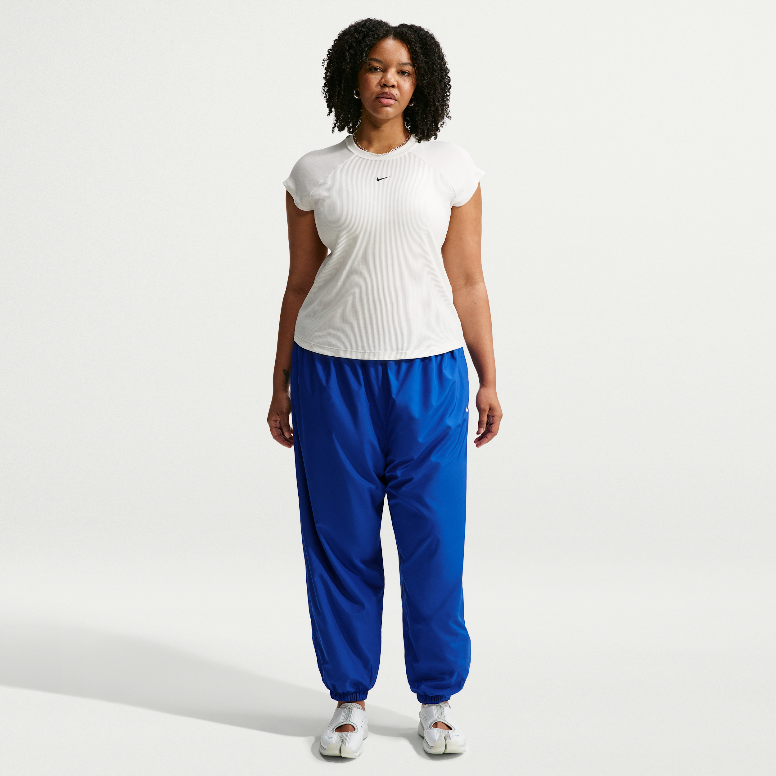 Women's Nike Sportswear Mid-Rise UV Jogger Pants (Plus Size) in Blue | IU8330-417