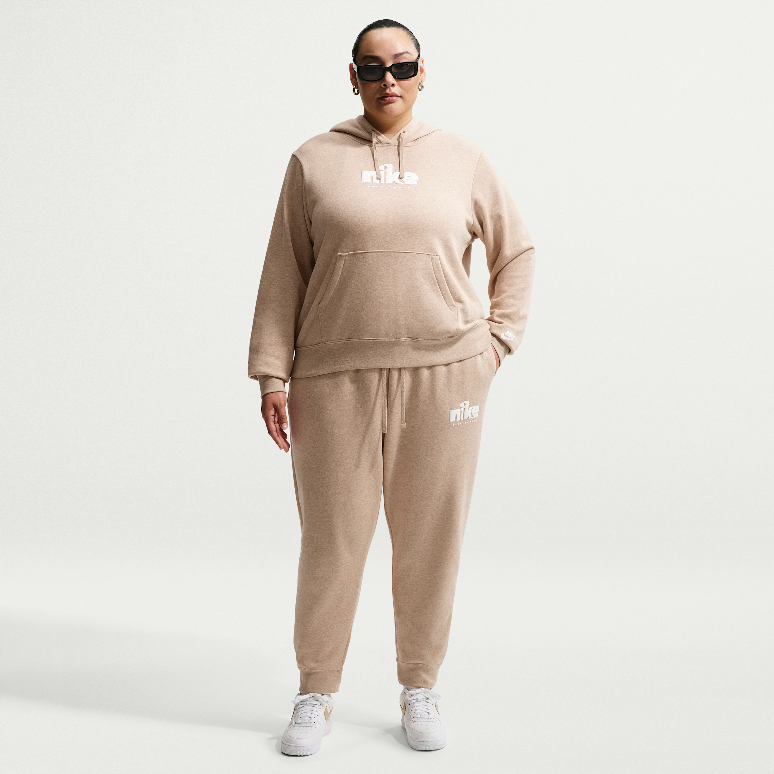 Women's Nike Sportswear Club Fleece Graphic Mid-Rise Pants (Plus Size) in Brown | IO6242-286