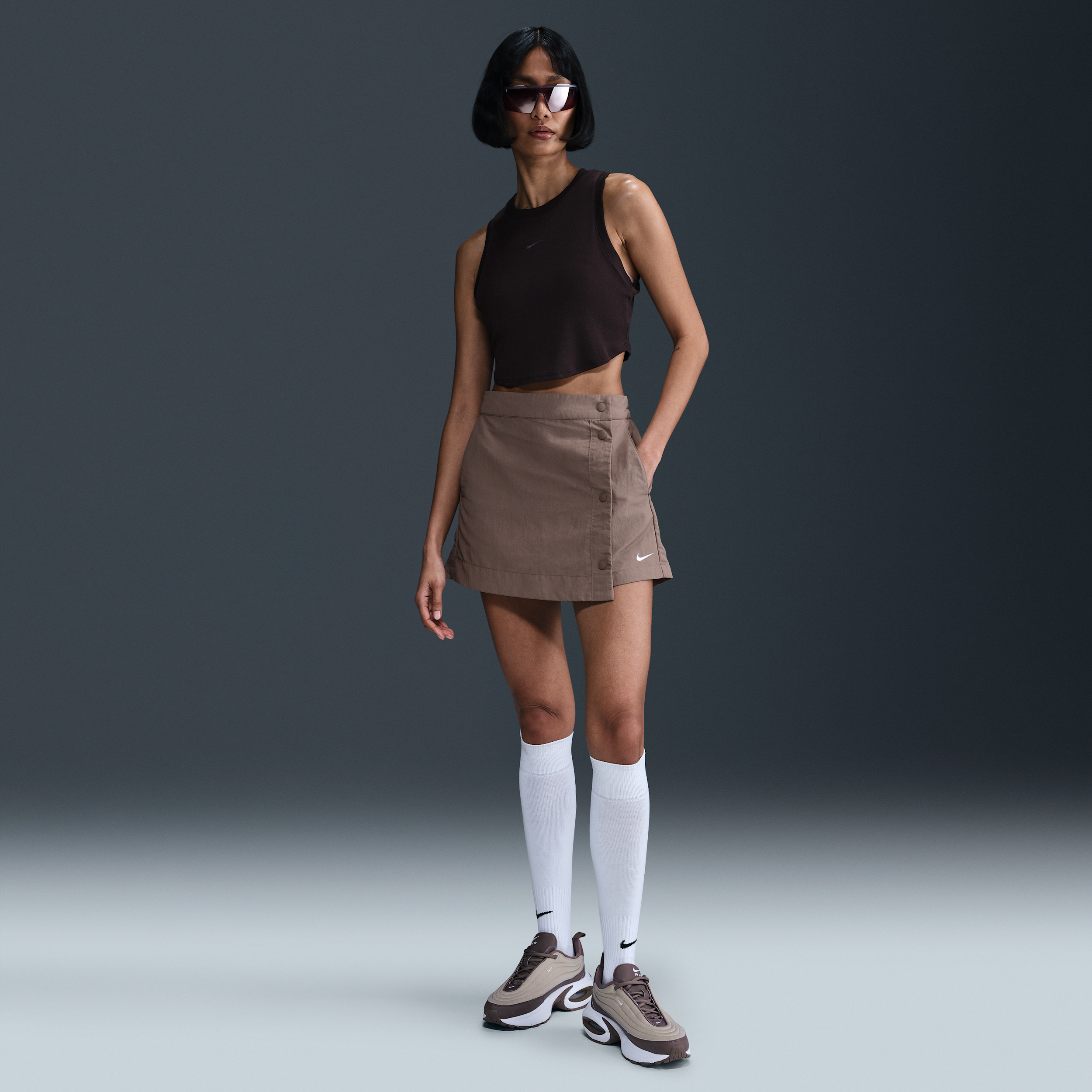 Nike Essential Water Repellent Skort In Brown