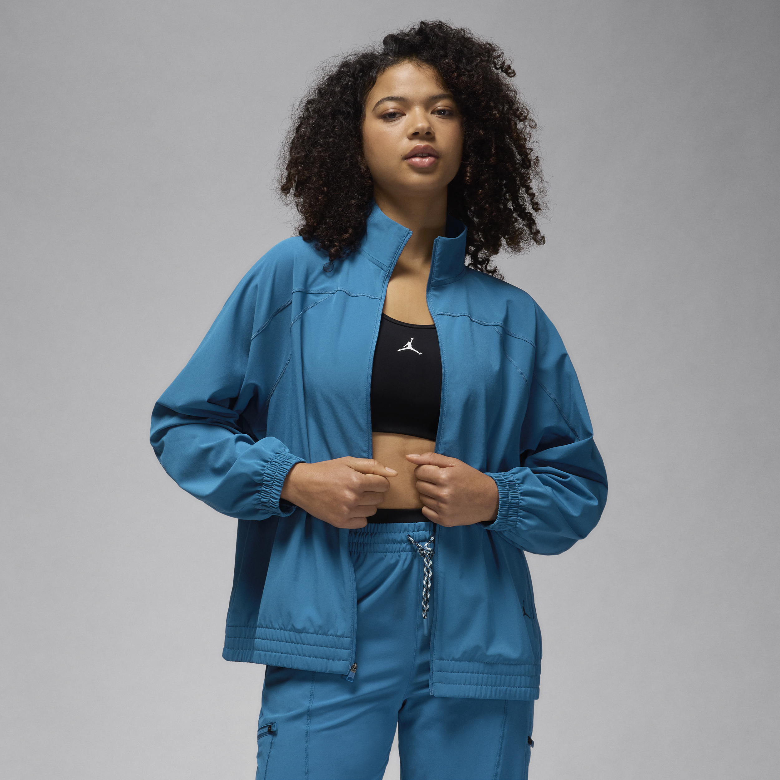 Shop Jordan Women's  Sport Dri-fit Woven Jacket In Blue