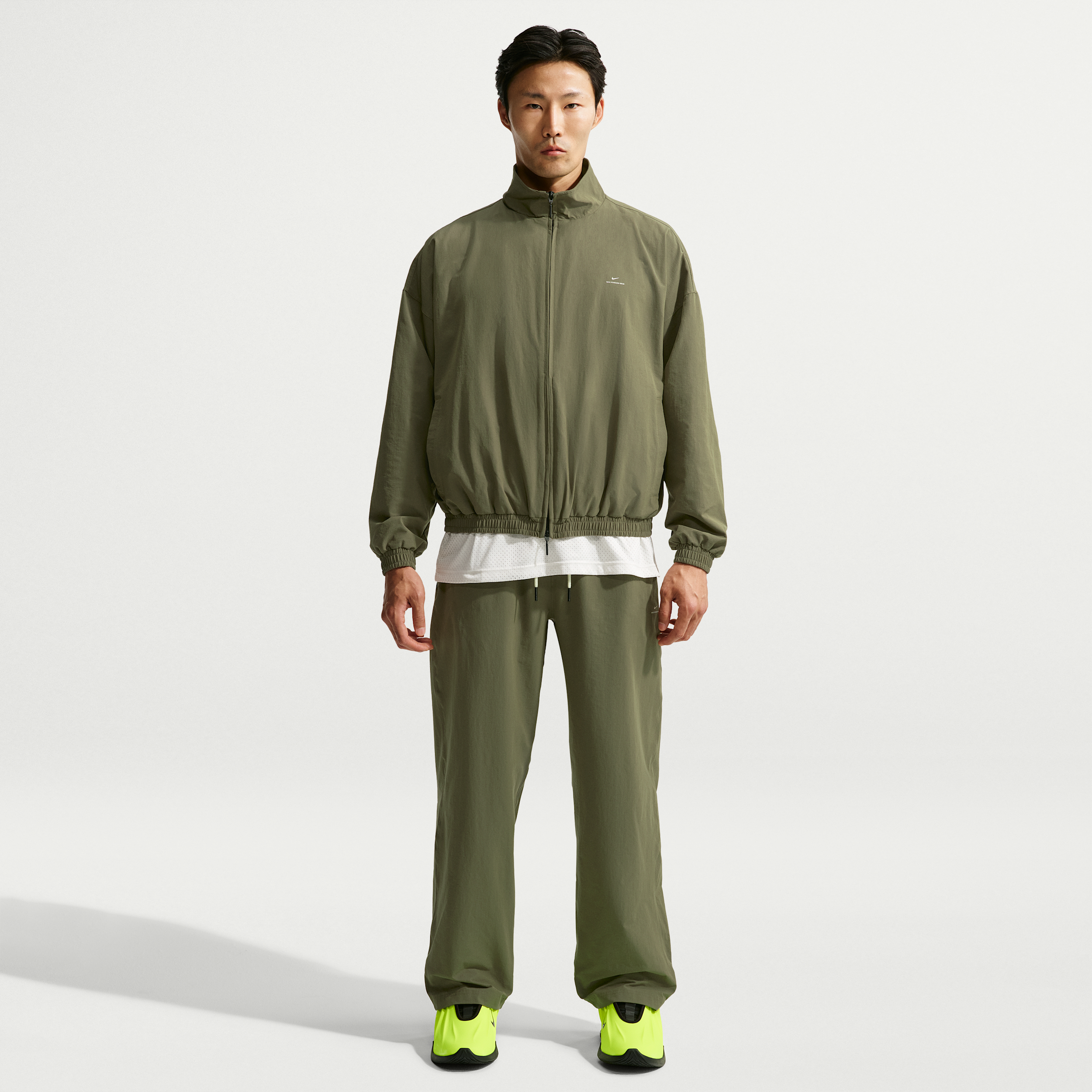 Nike Men's Standard Issue Dri-FIT Woven Basketball Pants in Green | IM5905-222