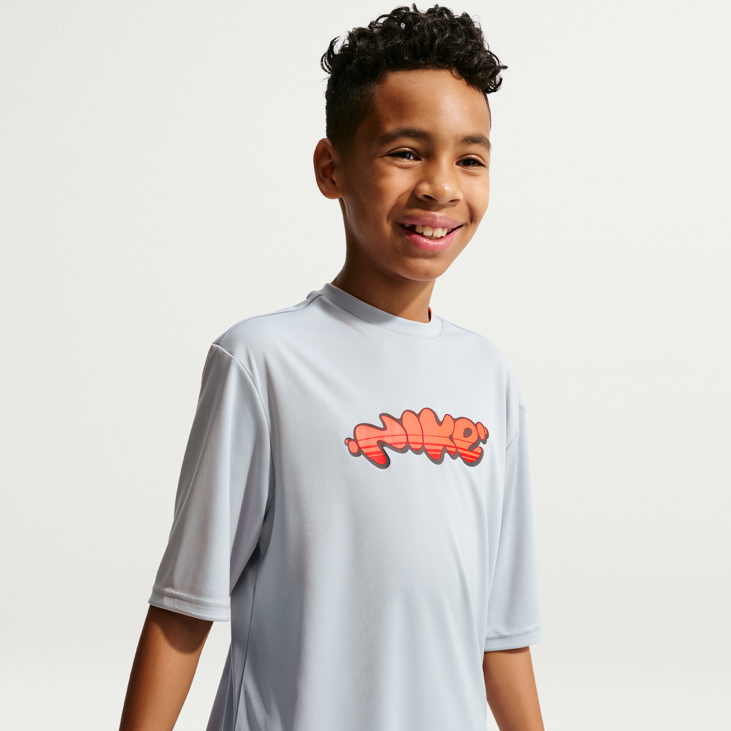 Nike Swim Hydroguard Big Kids' (Boys') Dri-FIT UV Short Sleeve Top in Grey | NESSG831-054