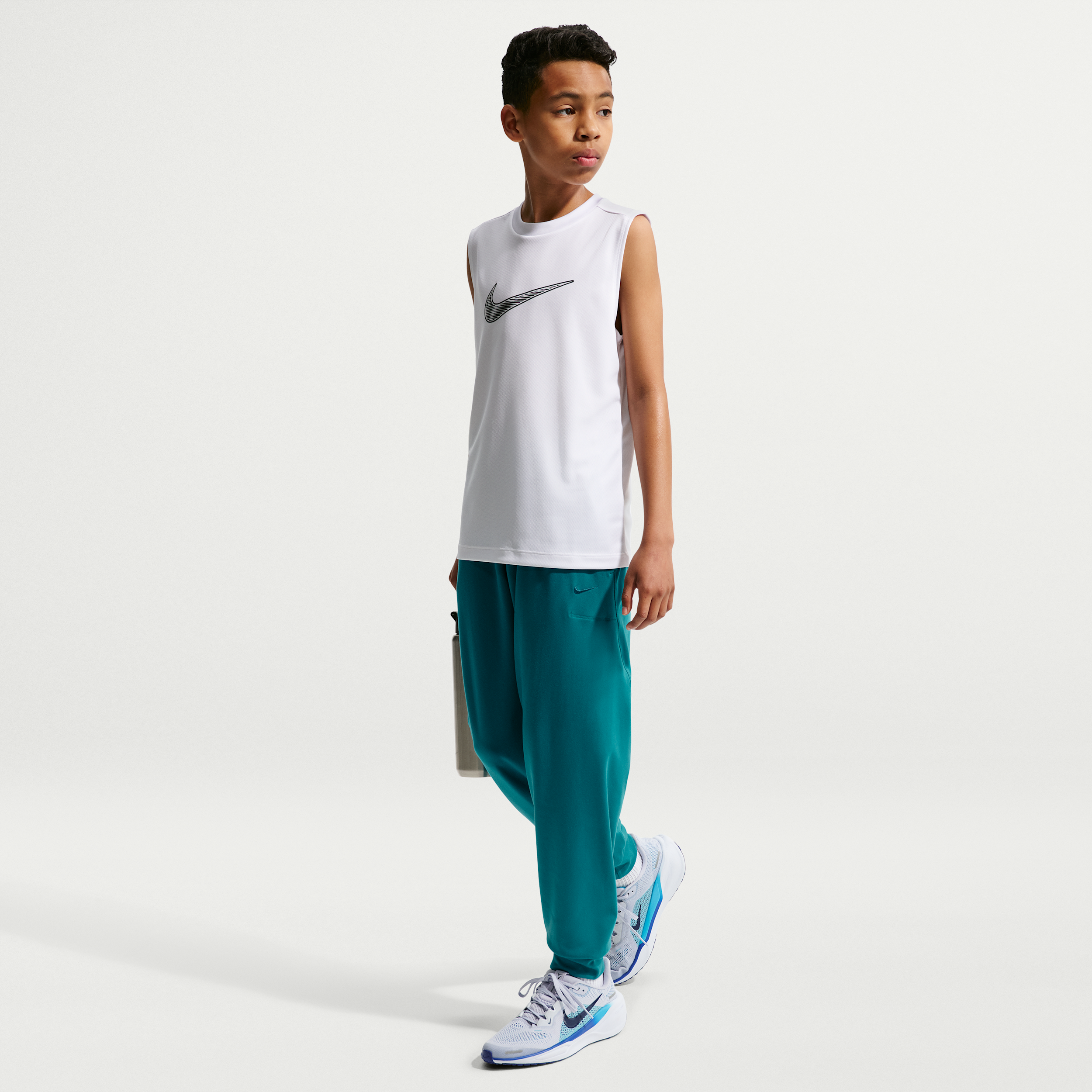 Nike Primary Nano Big Kids' (Boys') Dri-FIT UV Nano Jogger Pants in Blue | IU3118-372