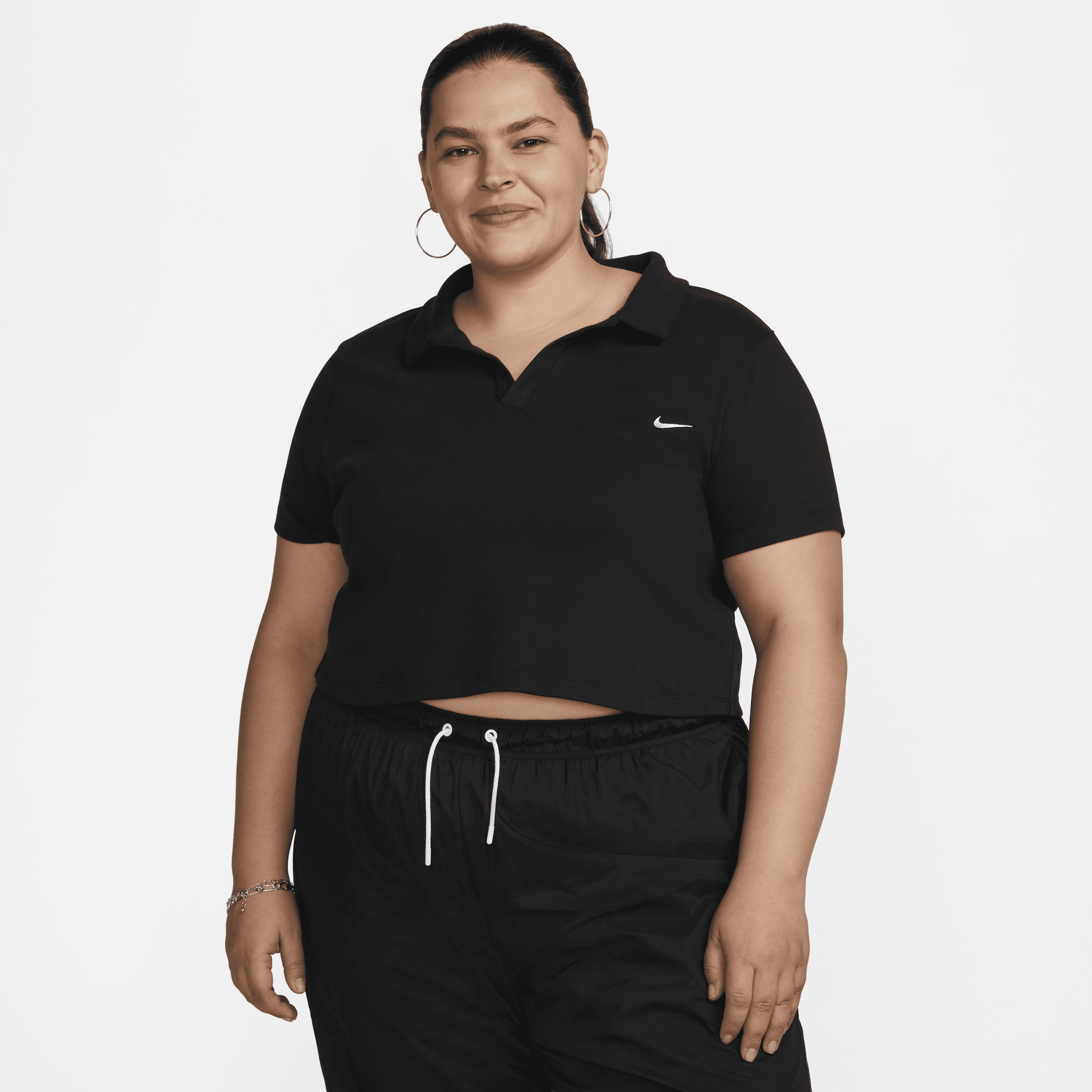 Nike Sportswear Essential Women's Short-Sleeve Polo Top.