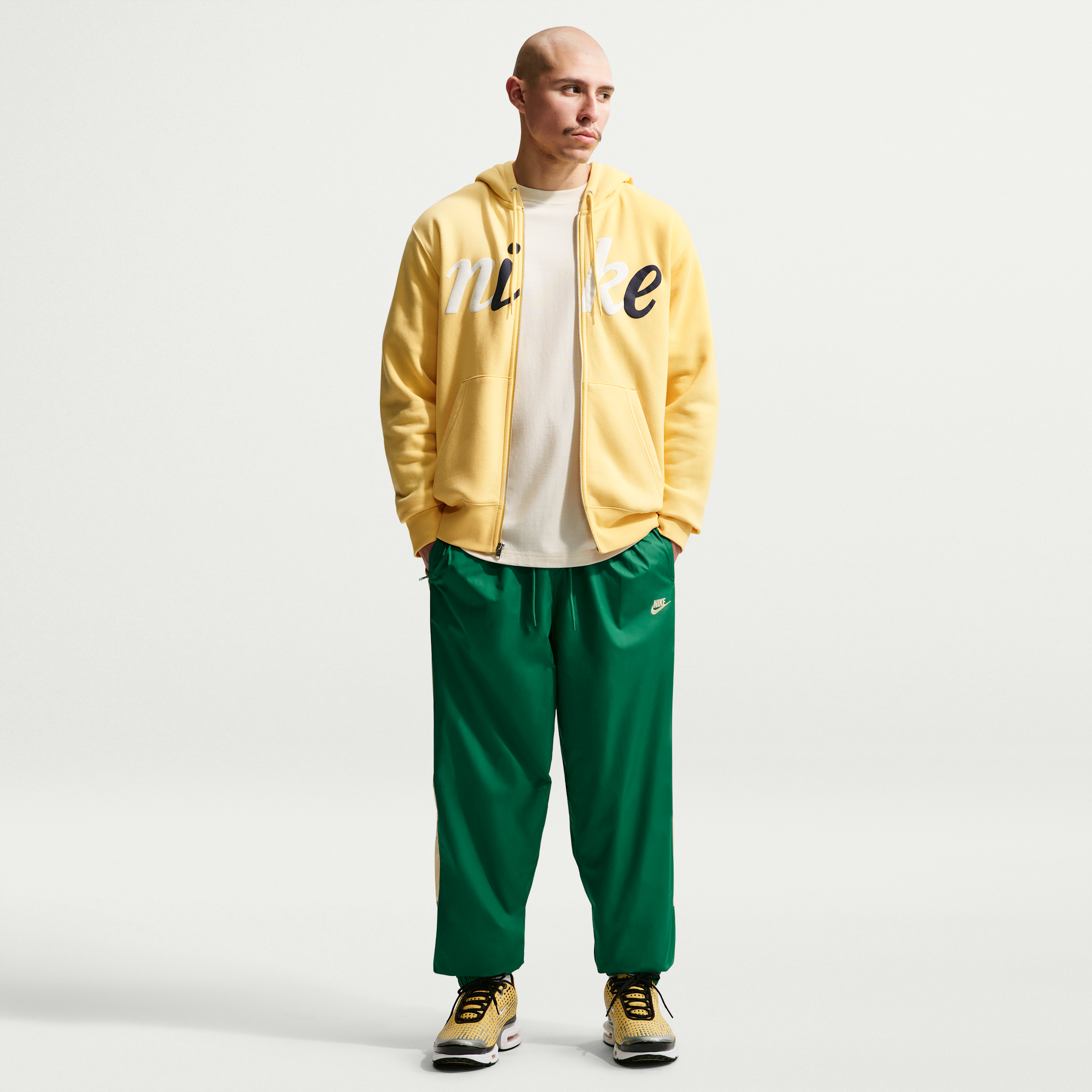 Nike Men's Windrunner Lined Pants in Green | HV8371-365