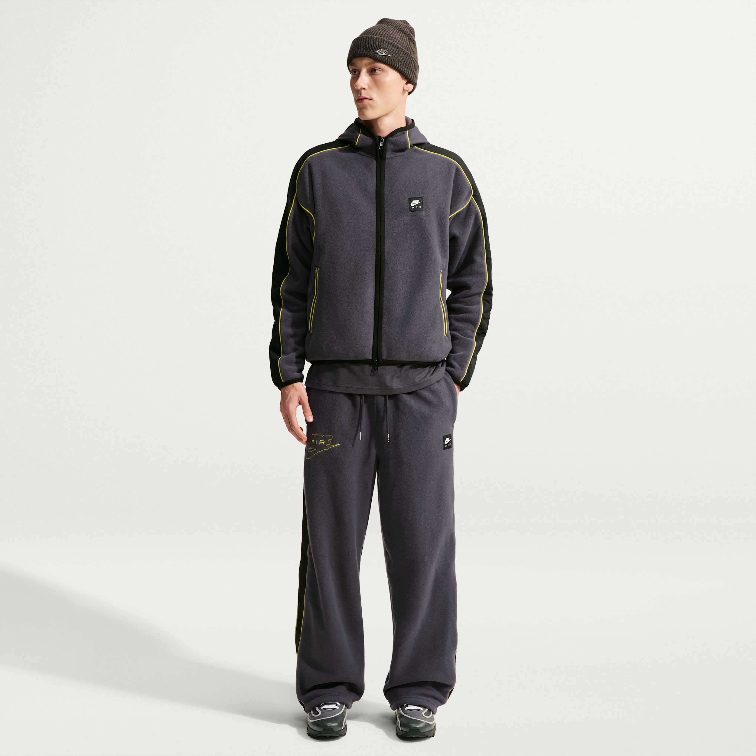Nike Men's Air Polartec® Therma-FIT Open-Hem Pants in Grey | IQ6511-013