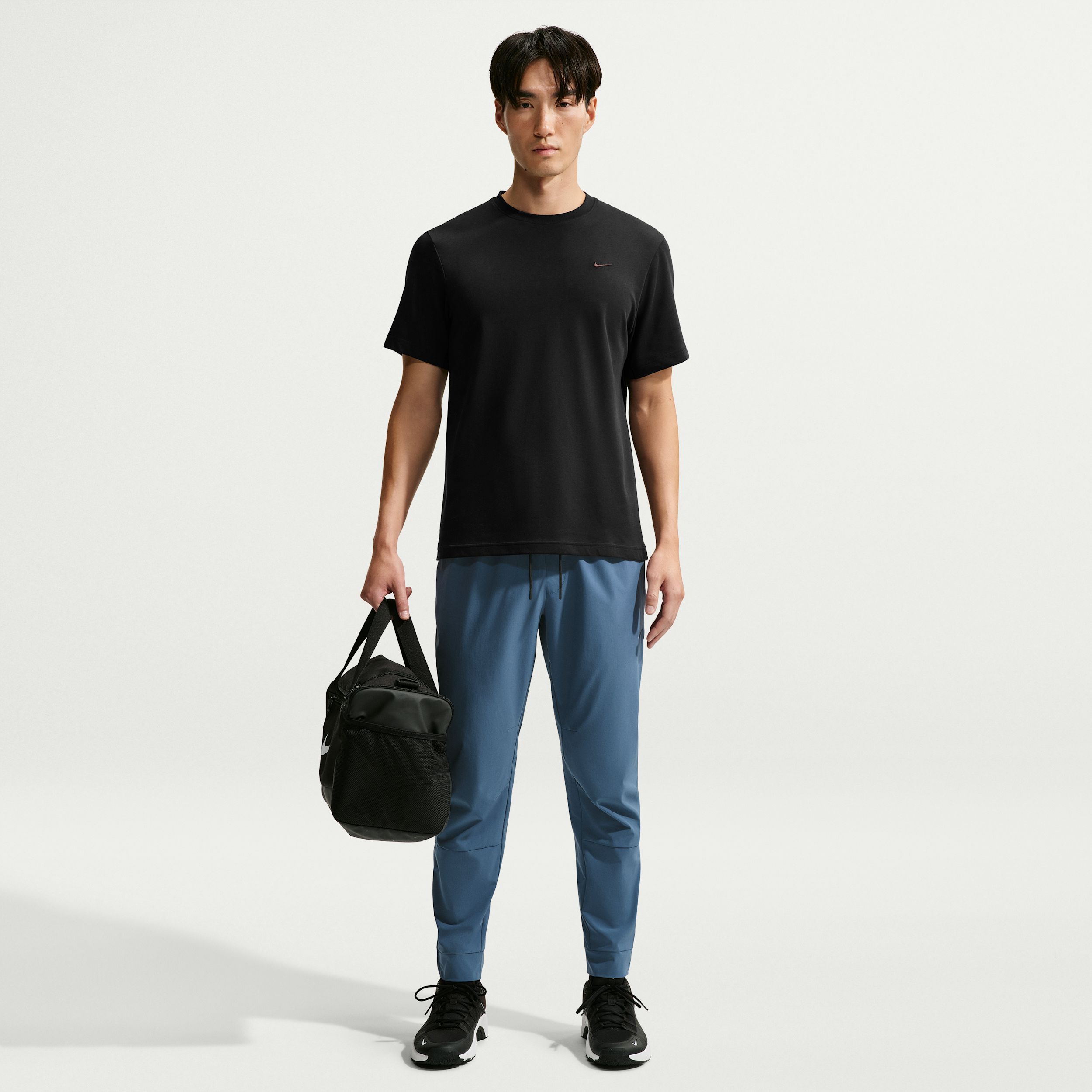 Nike Men's Unlimited Dri-FIT Zippered Cuff Versatile Pants in Blue | FB7548-438