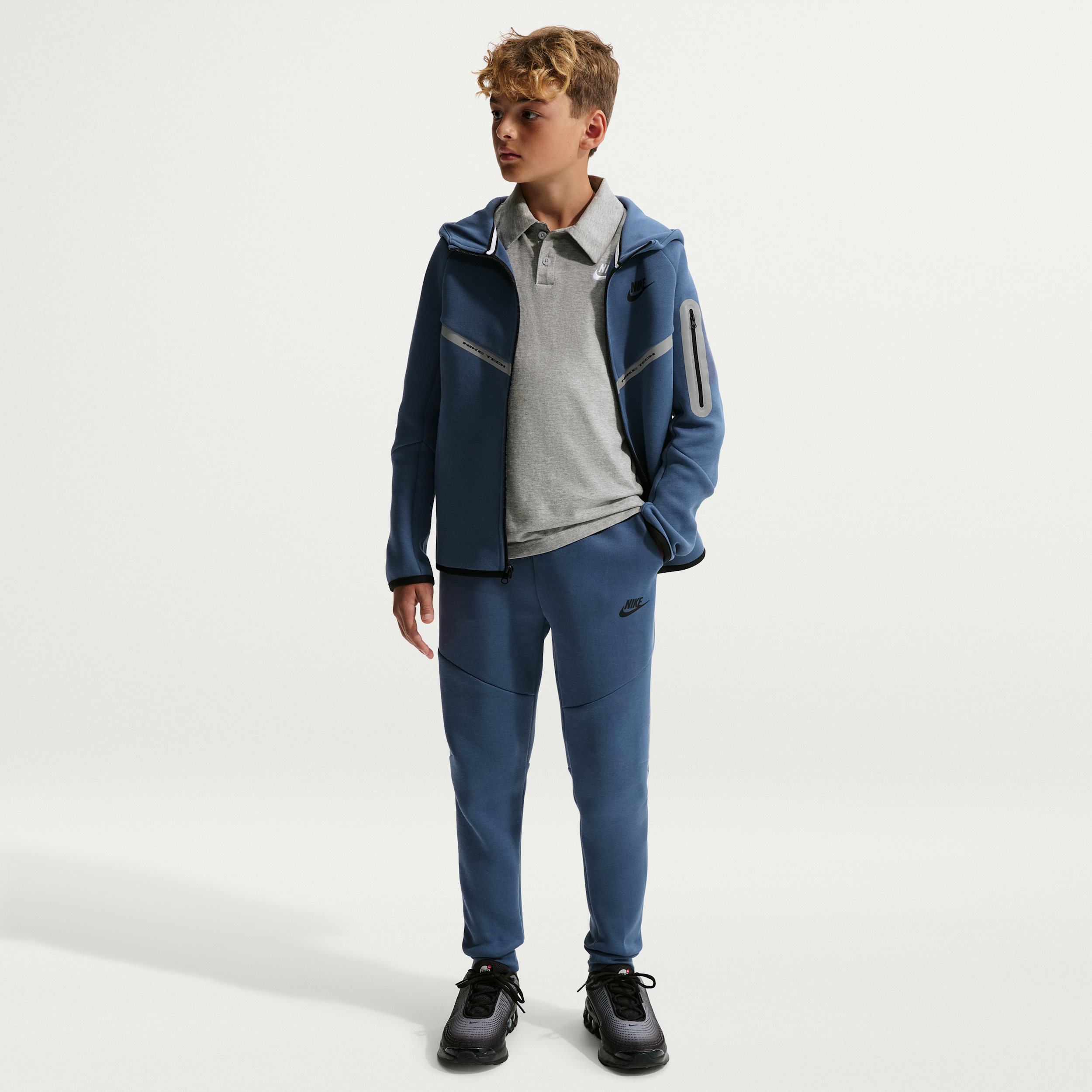 Nike Sportswear Tech Fleece Big Kids' Jogger Pants with Reflective Accents in Blue | IM9163-491