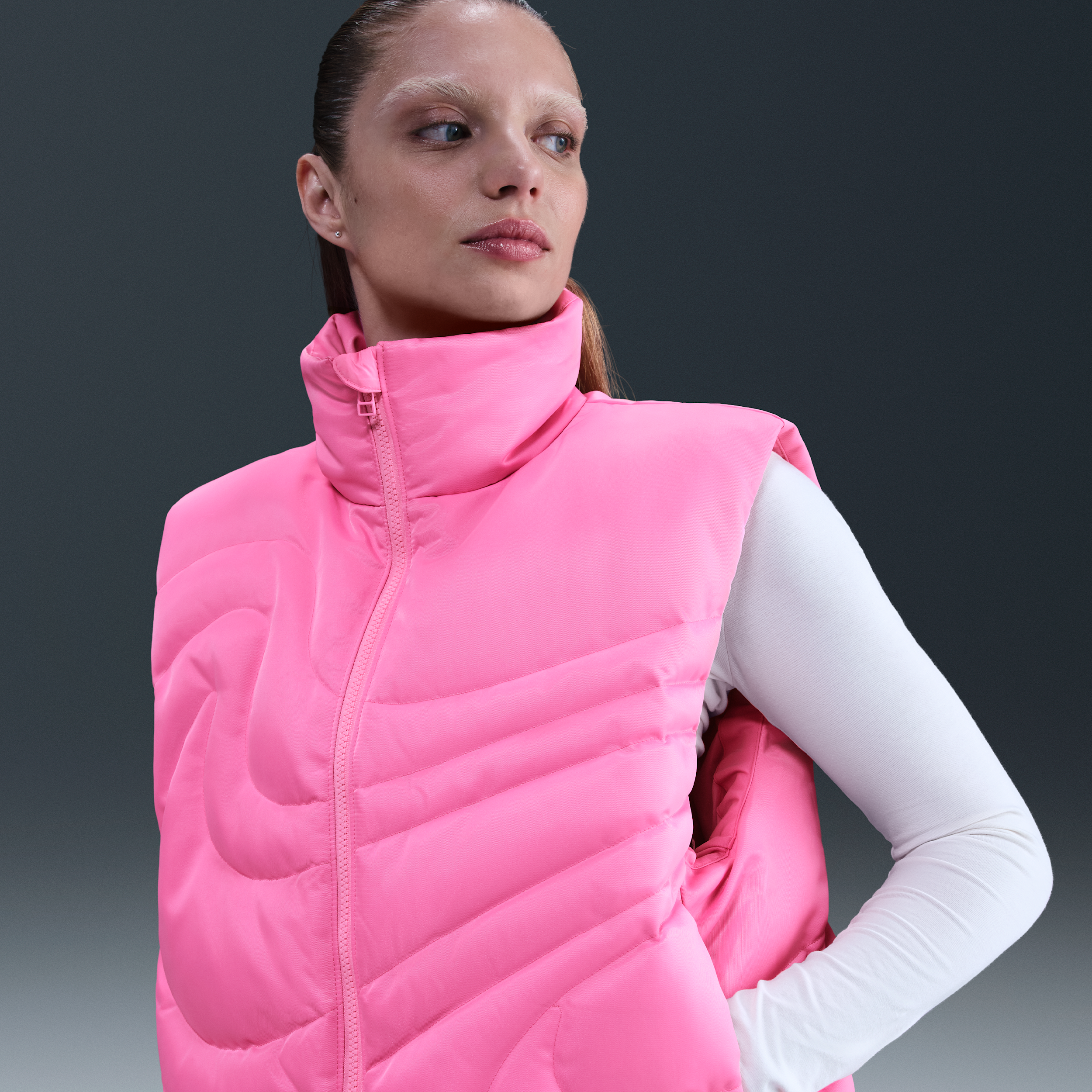 Nike Swoosh Series Oversized Down Vest In Pink