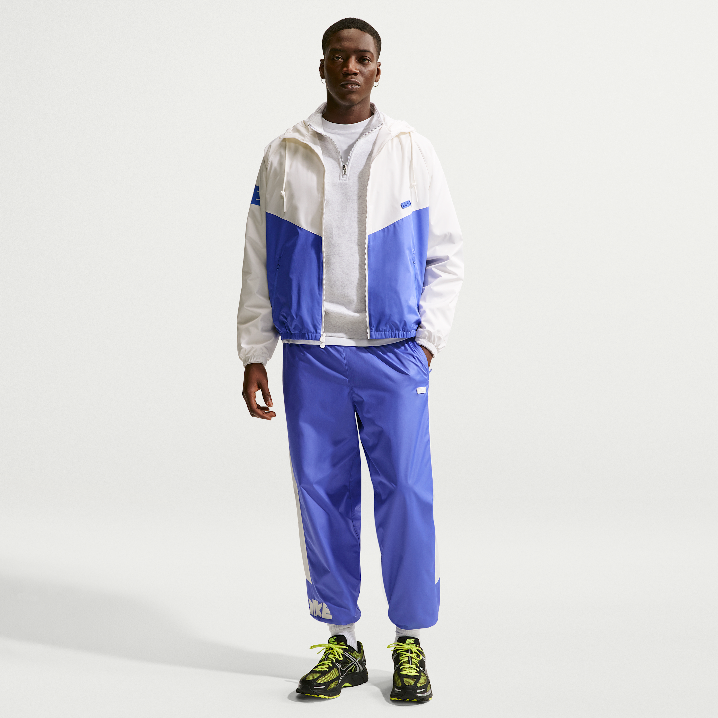 Nike Men's Windrunner Woven Graphic Pants in Blue | IF0842-570