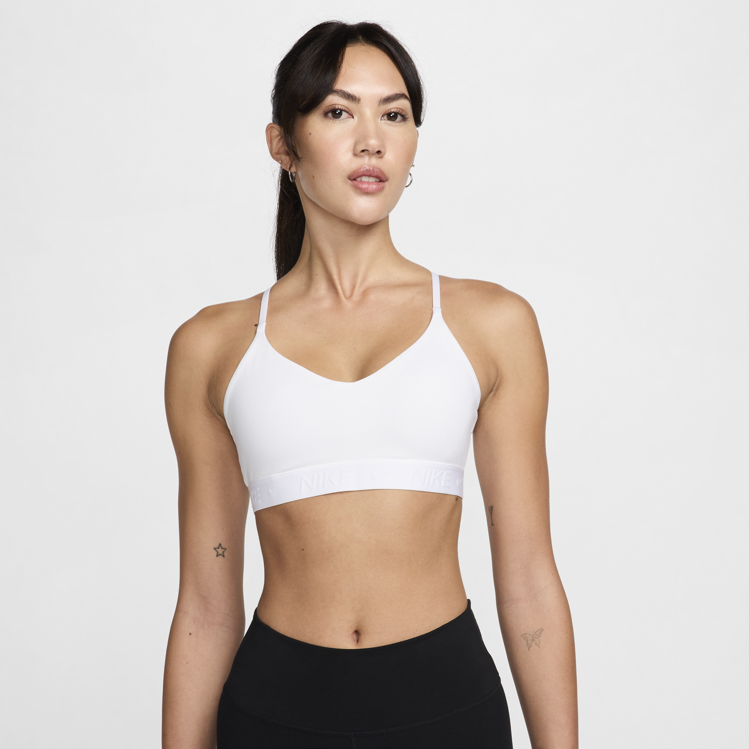 Shop Nike Women's Indy Light Support Padded Adjustable Sports Bra In White