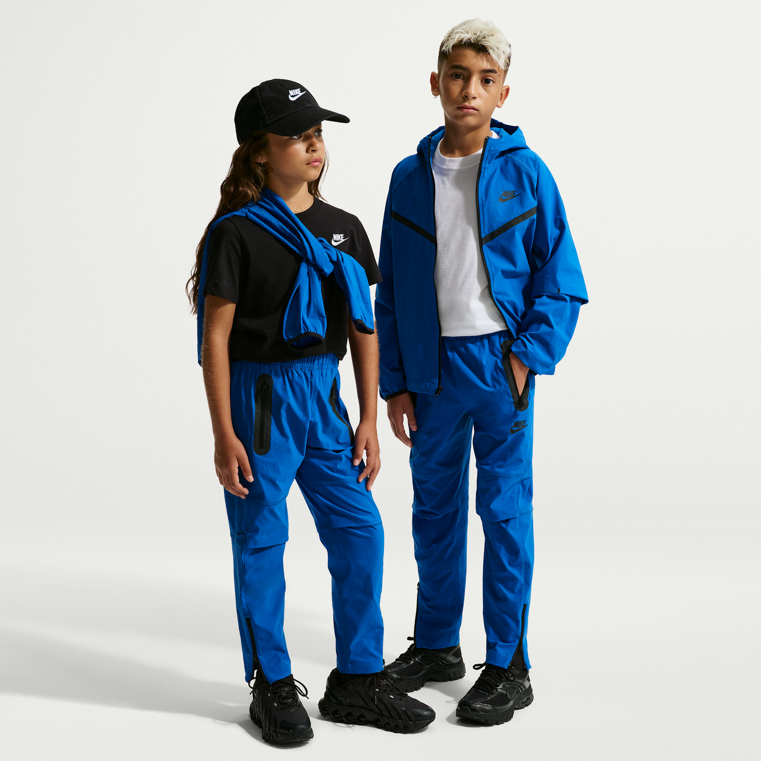 Nike Tech Big Kids' (Boys') Woven Pants in Blue | HQ8921-480