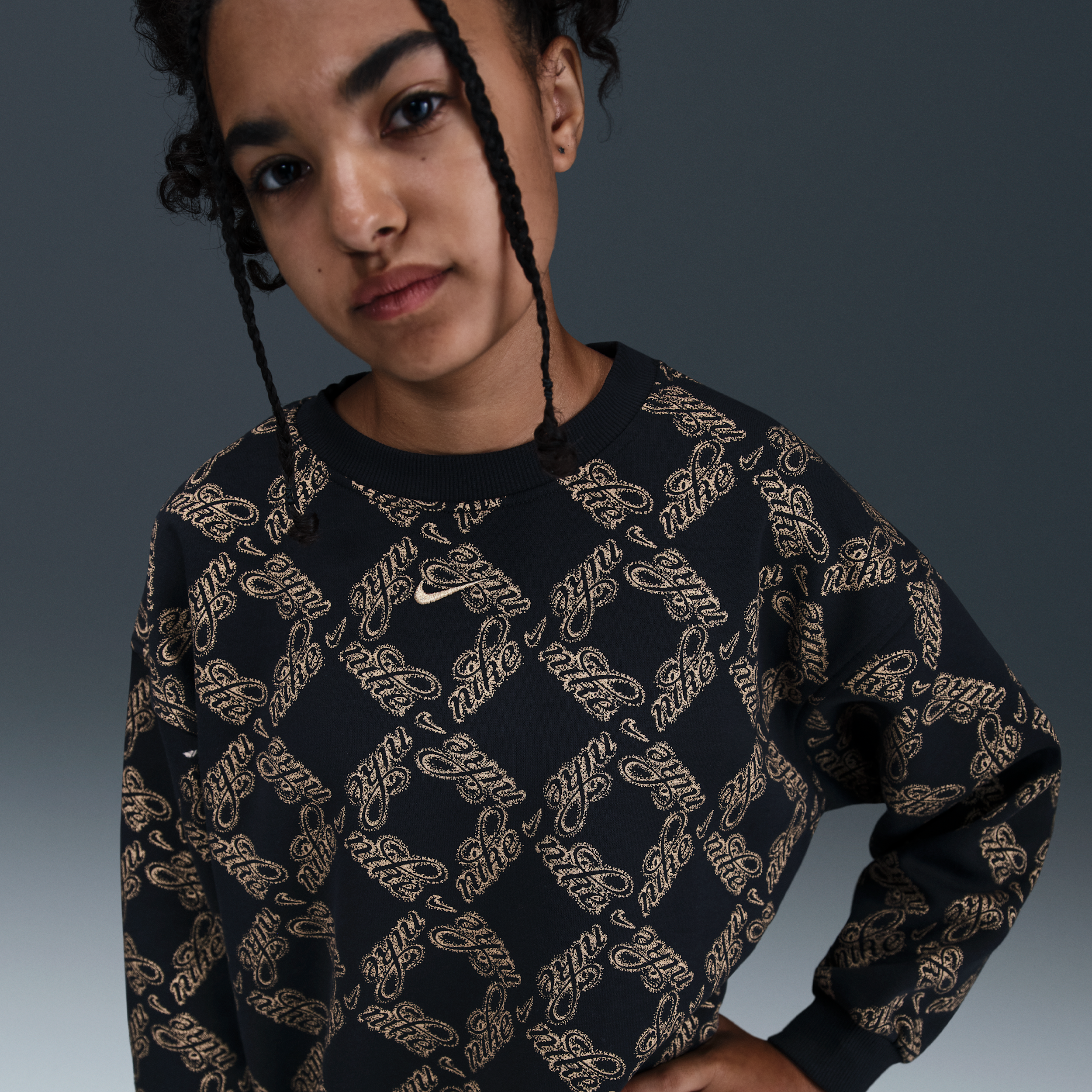Nike Sportswear Club Fleece Big Kids' (Girls') Oversized Printed Crewneck Sweatshirt in Black | HV0430-010