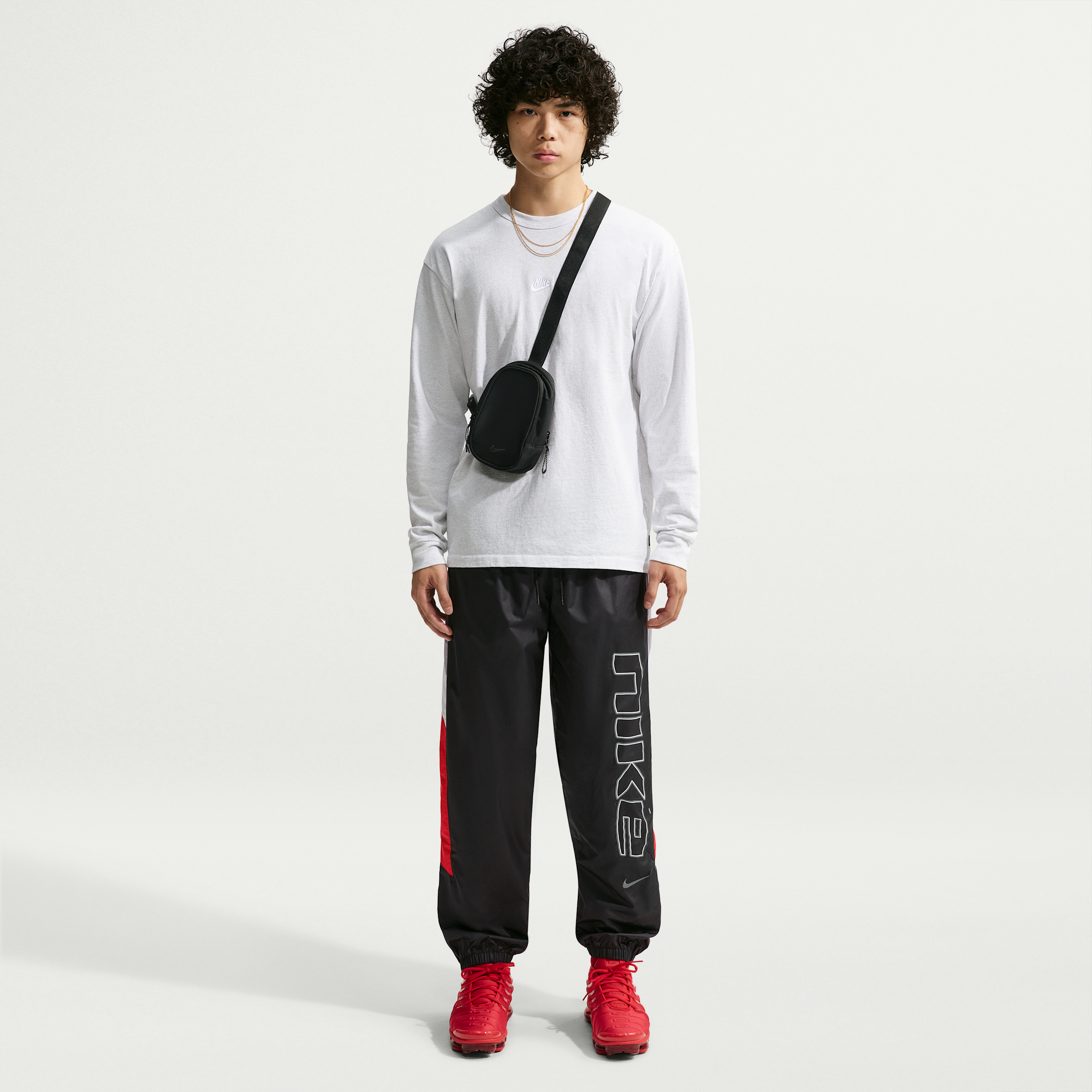 Nike Men's Sportswear Windrunner Lined Track Pants in Black/University Red/Cement Grey Size: Medium