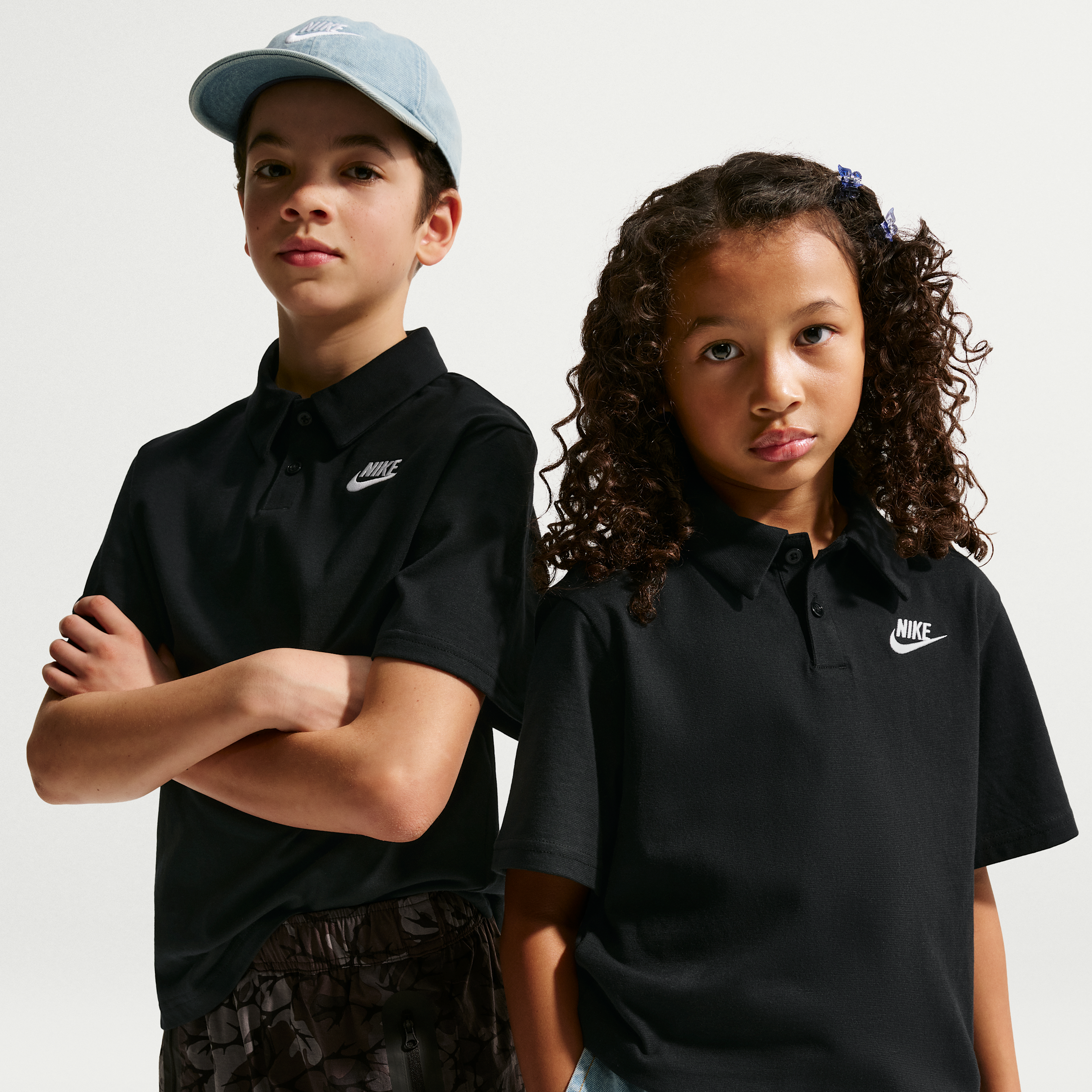 Nike Sportswear Club Big Kids' Knit Short-Sleeve Polo in Black | IF2841-010