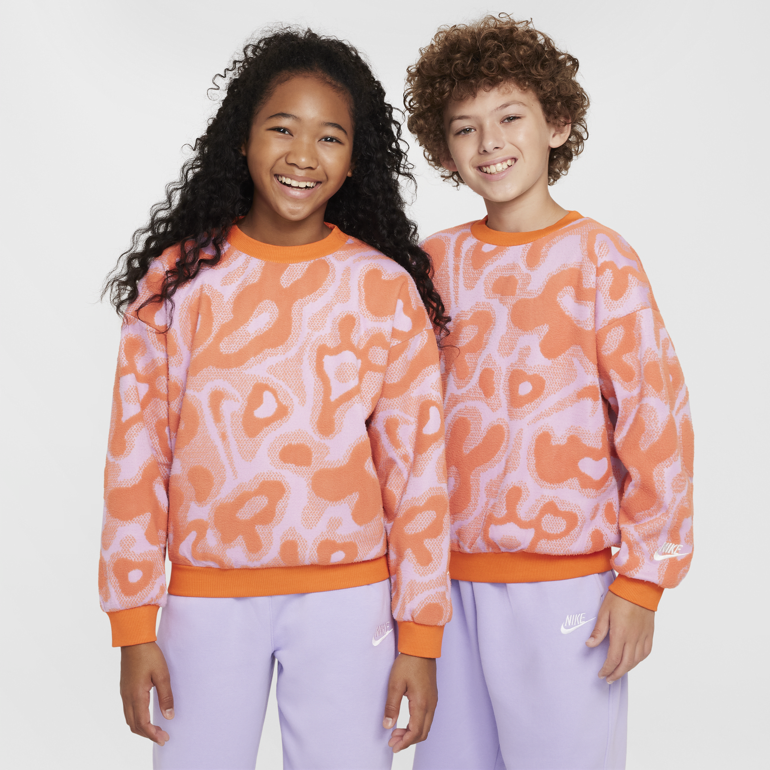 Nike Sportswear Big Kids' Oversized Fleece Crew-Neck Sweatshirt in Pink | FZ5487-632