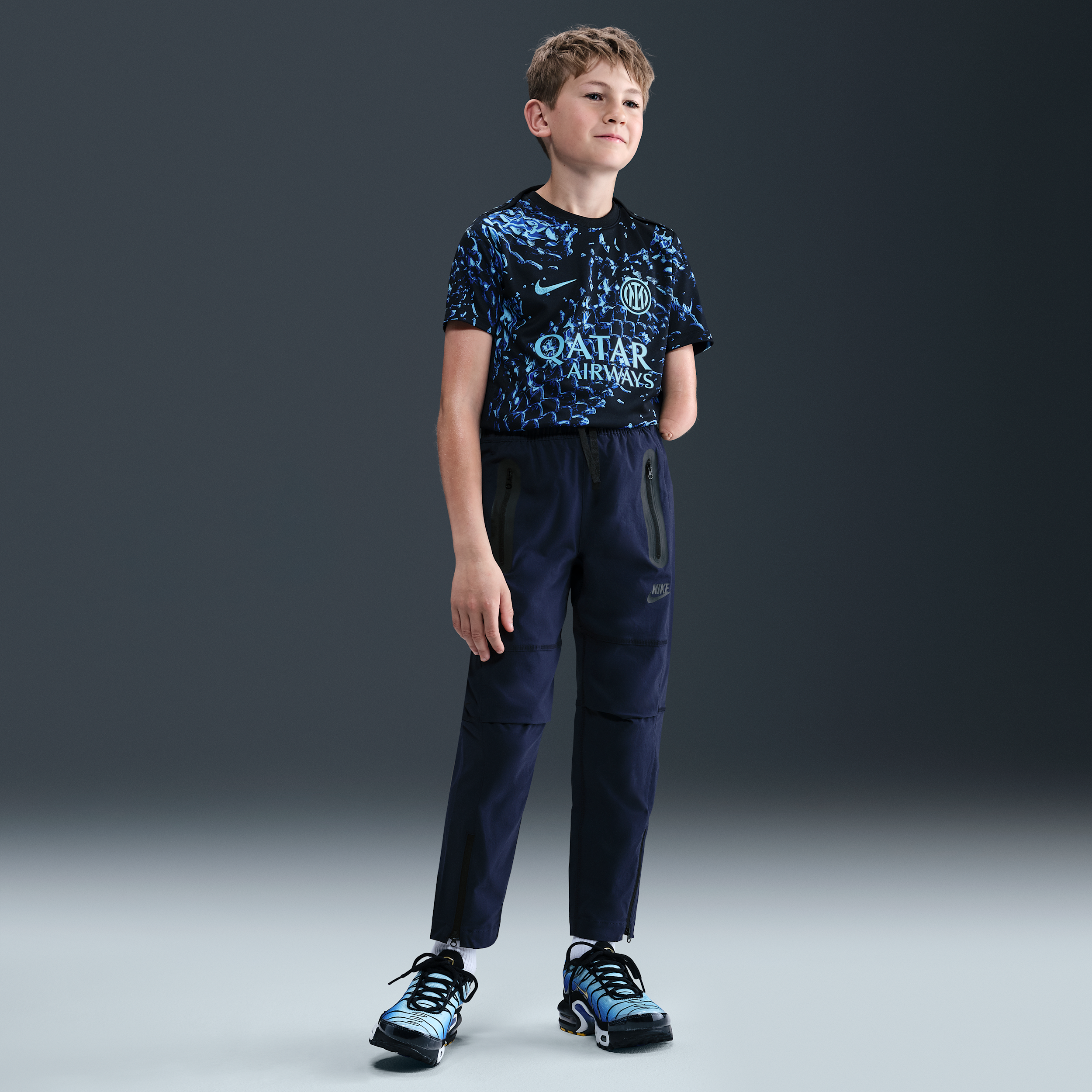 Nike Tech Big Kids' (Boys') Woven Pants in Blue | HQ8921-451