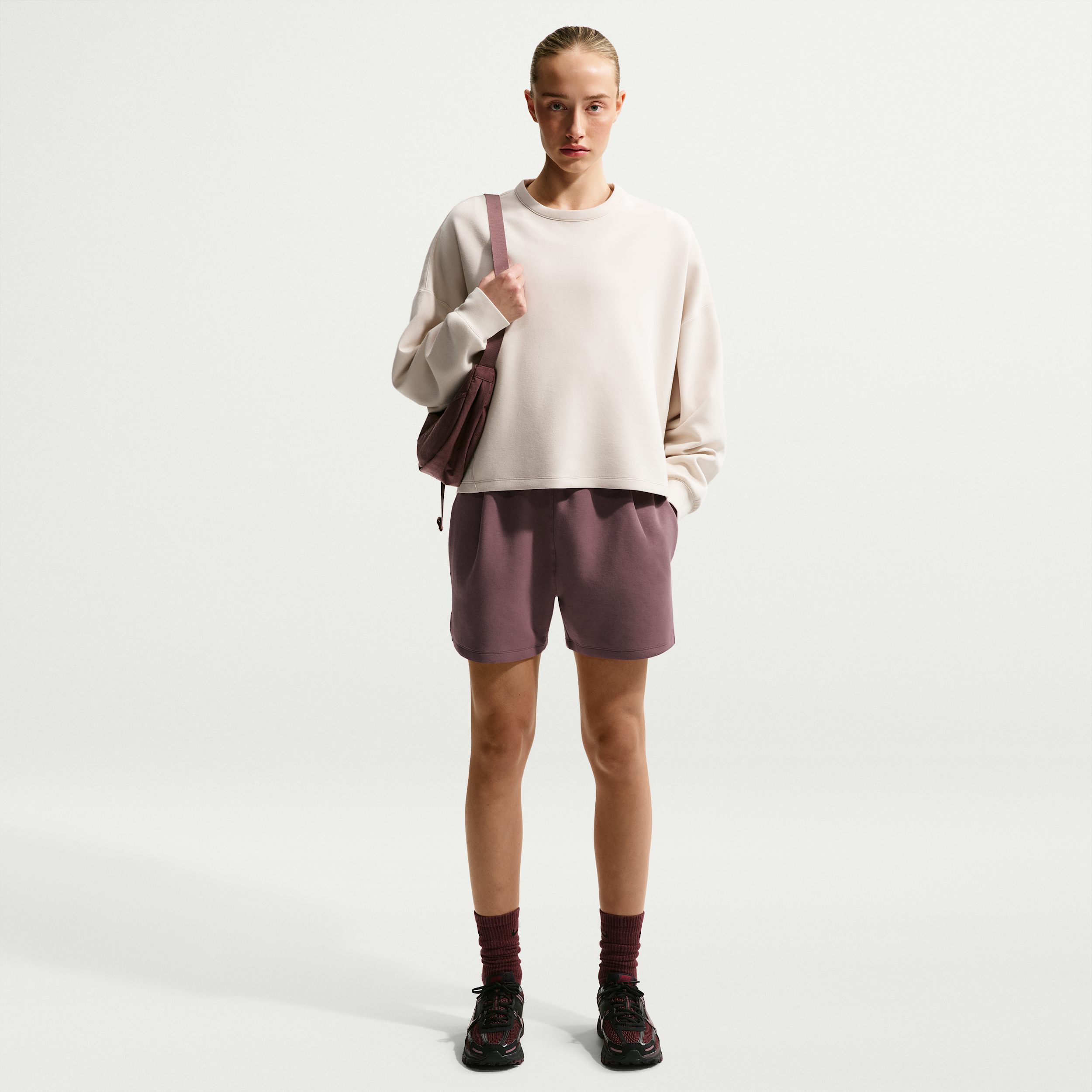 Nike Women's 24.7 ImpossiblySoft Dri-FIT Mid-Rise Loose 4" Shorts in Purple | HQ8179-502