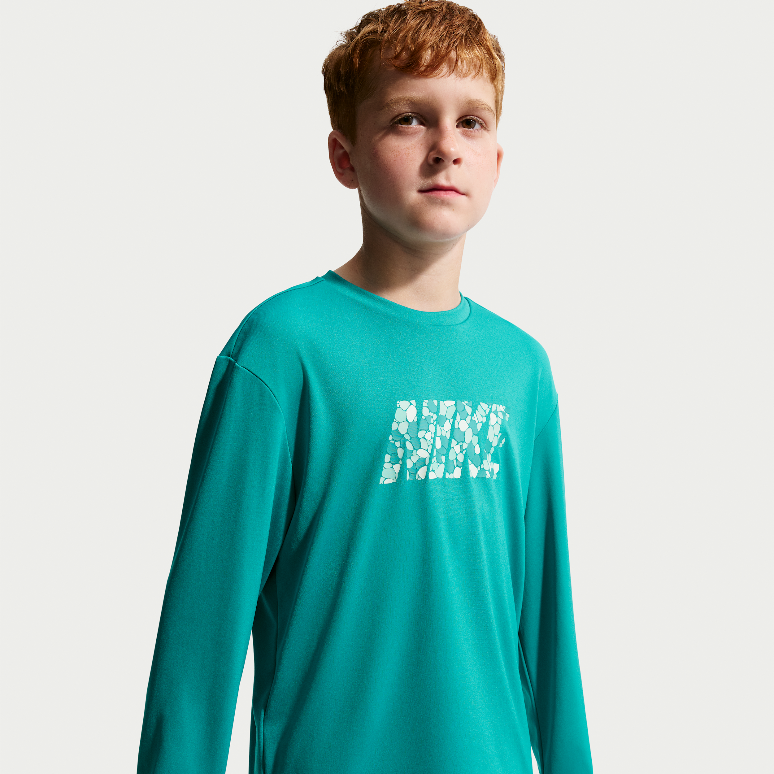 Nike Swim Hydroguard Big Kids' (Boys') Dri-FIT UV Long Sleeve Top in Green | NESSG842-385