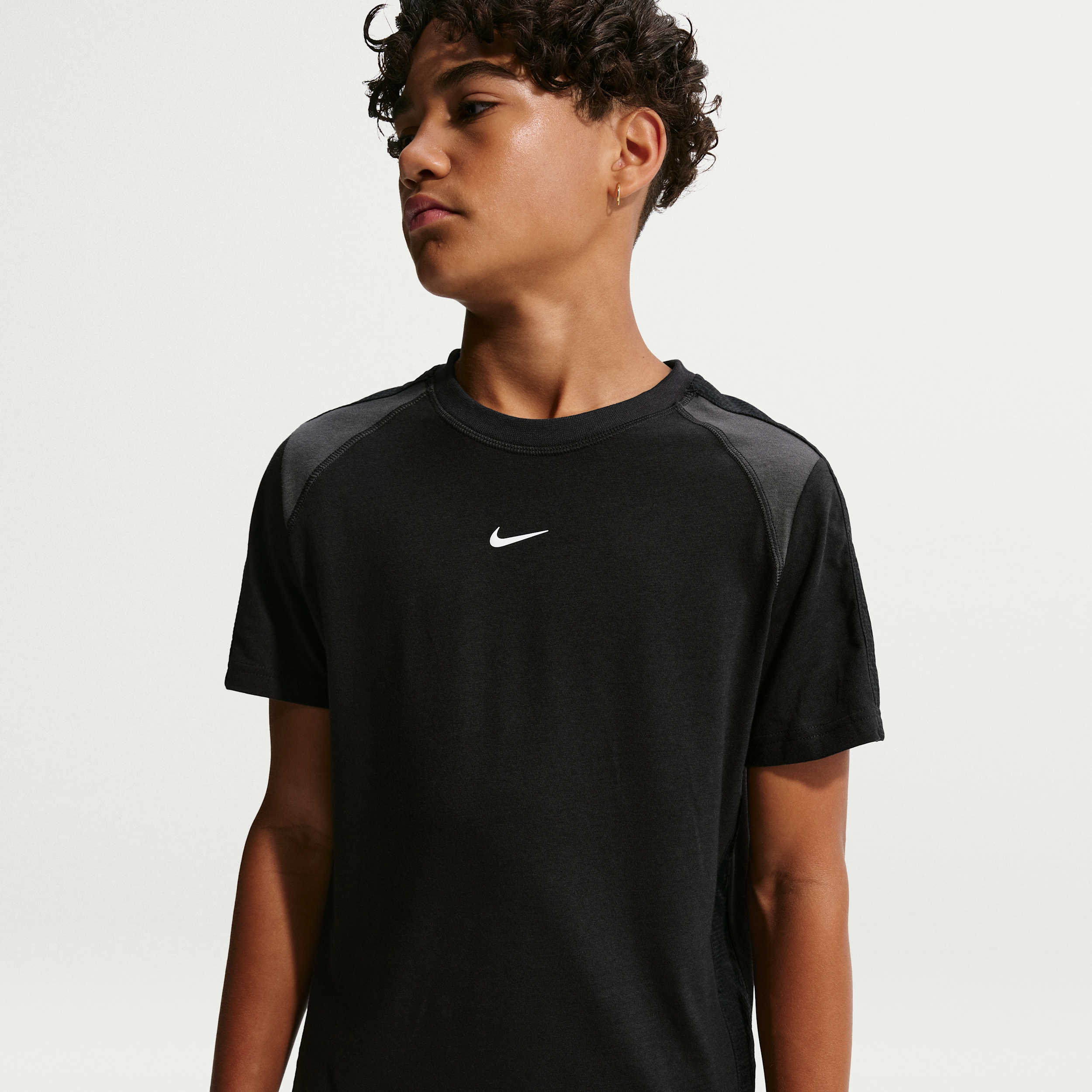 Nike Sportswear City Utility Big Kids' Short-Sleeve Top in Black | IO1704-010