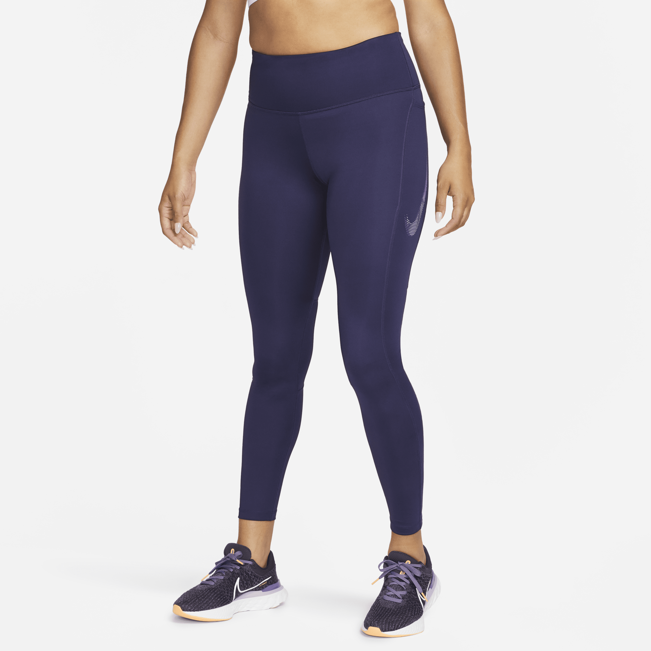 Shop Nike Women's Fast Mid-rise 7/8 Graphic Leggings With Pockets In Purple
