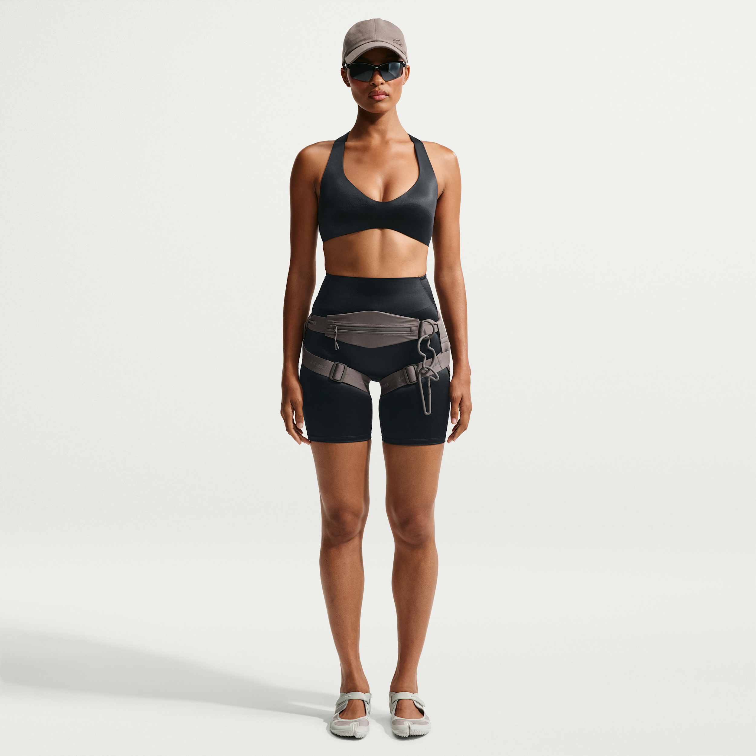 Nike Women's SKIMS Satin Shine Mid-Rise 7" Bonded Biker Shorts in Black | IR8689-054