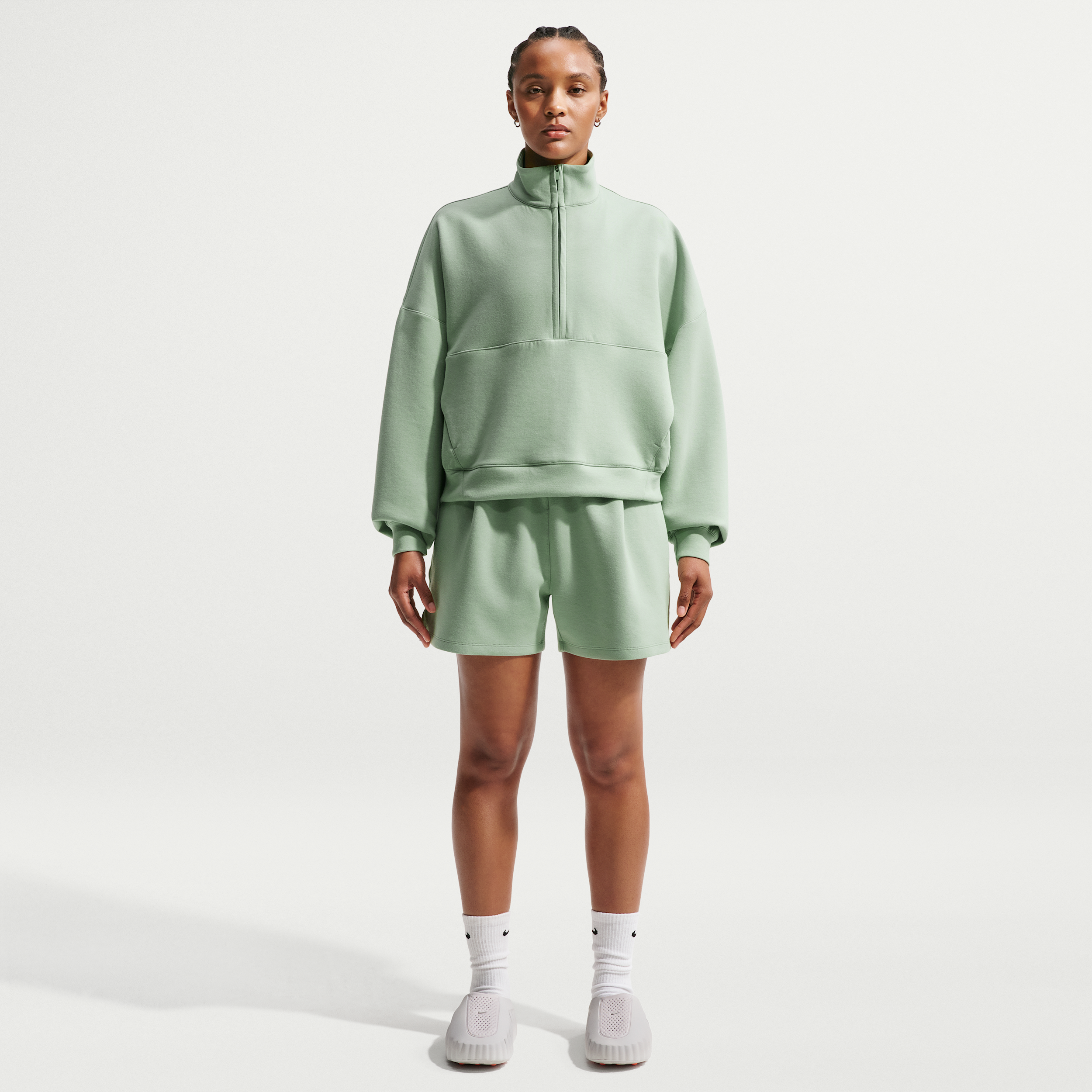 Nike Women's 24.7 ImpossiblySoft Dri-FIT Mid-Rise Loose 4" Shorts in Green | HQ8179-006