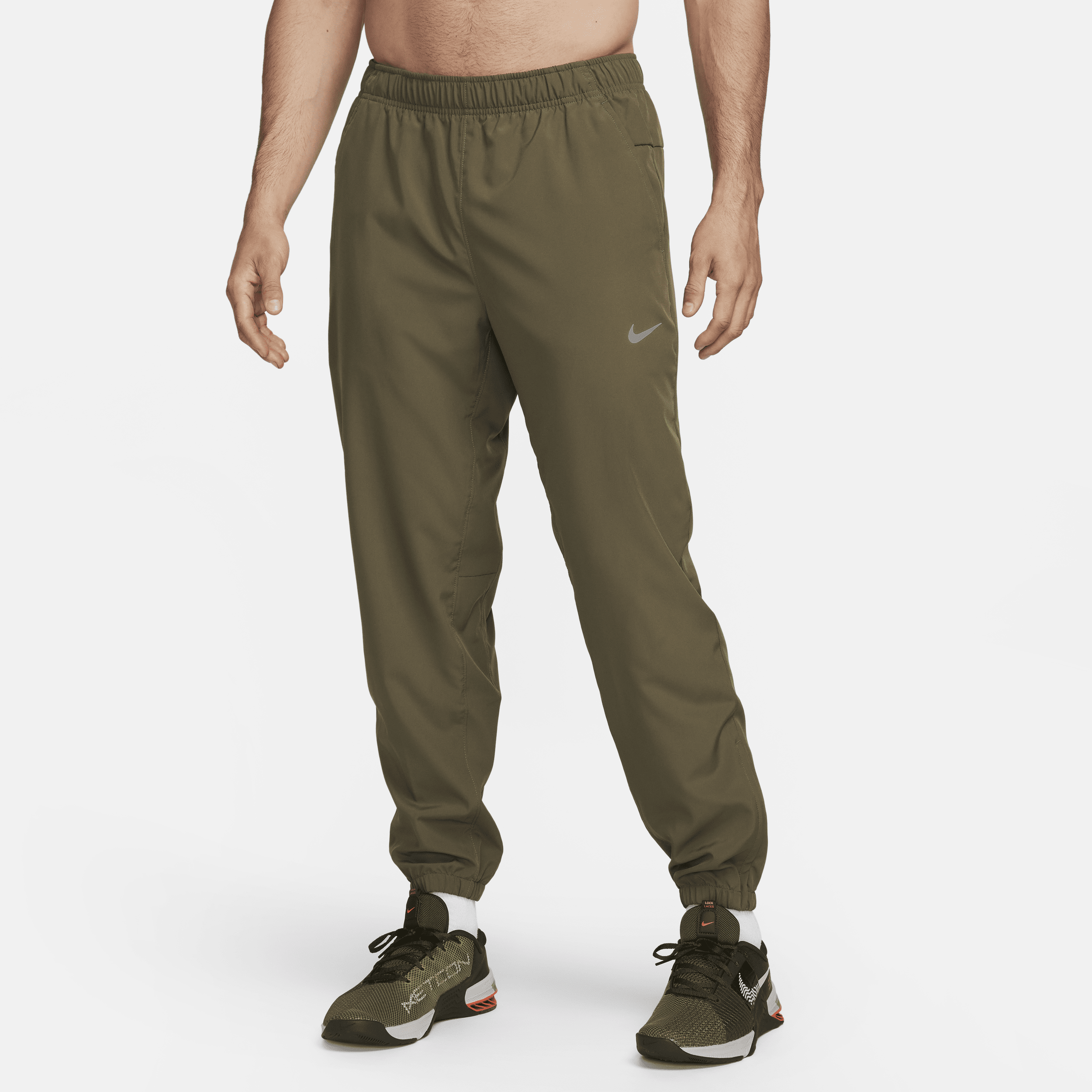 Nike Men's Form Dri-fit Tapered Versatile Pants In Green