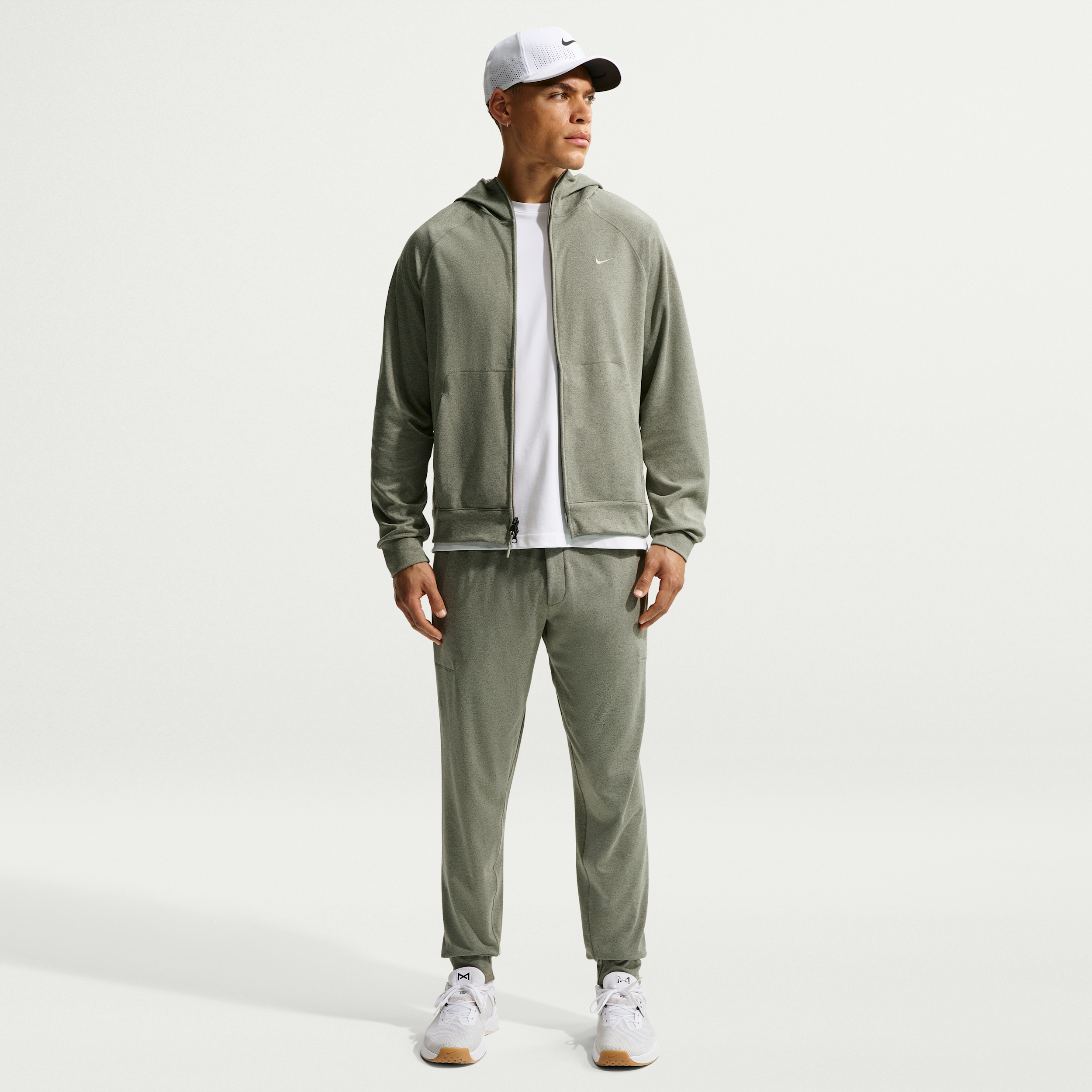 Nike Men's Primary NanoKnit Dri-FIT UV Protection Performance Jogger Pants in Green | II1312-320