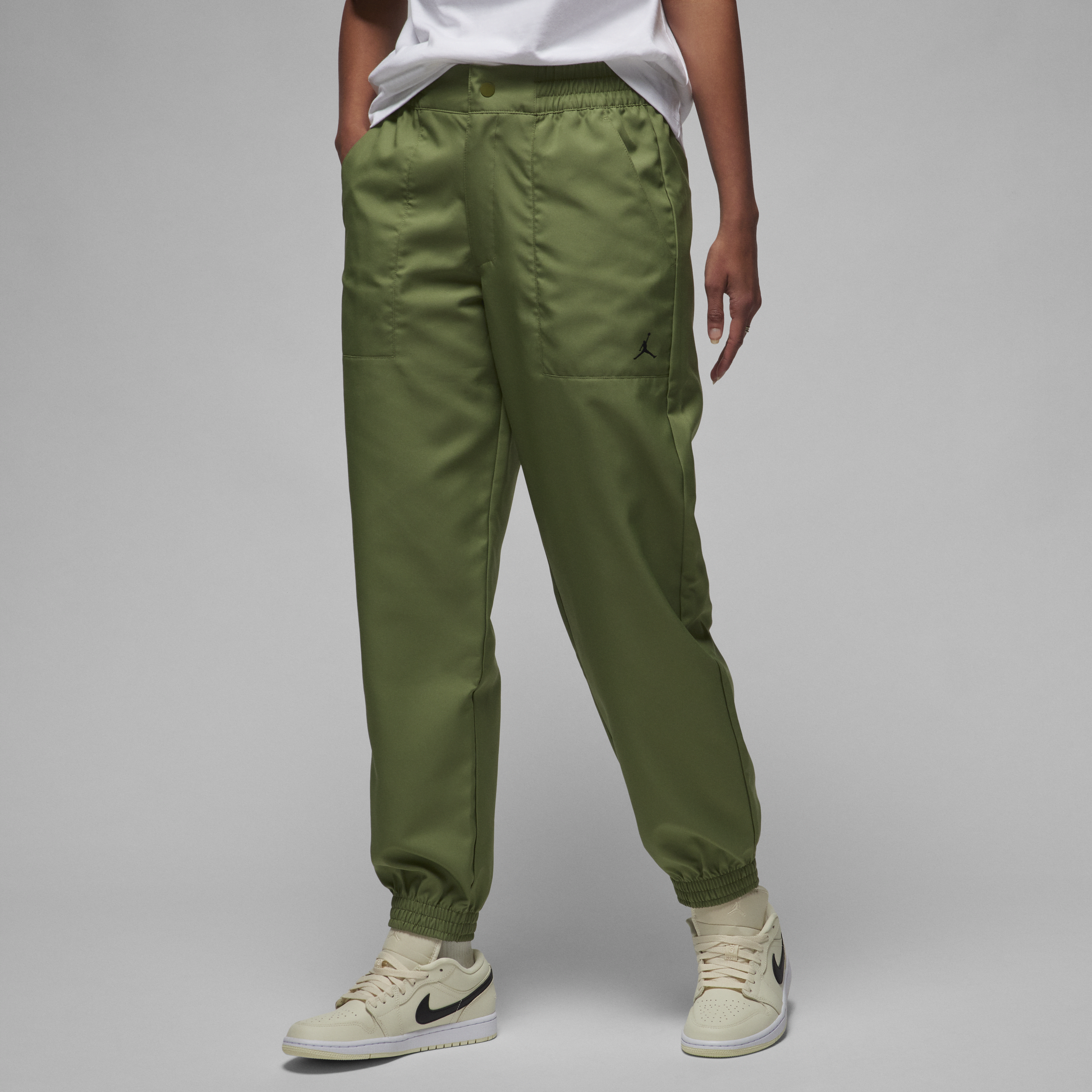 Shop Jordan Women's  Woven Pants In Green