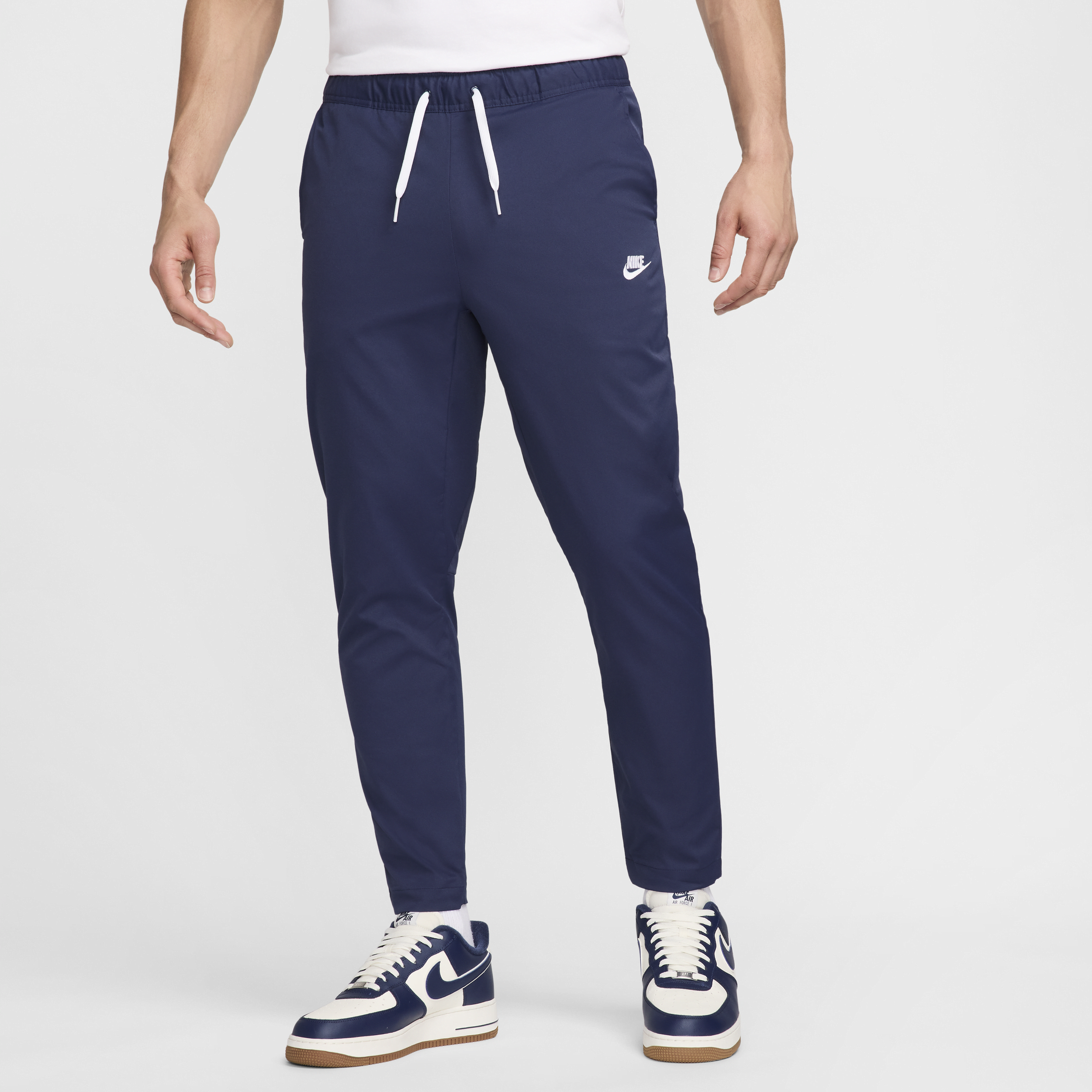 Nike Men's Club Woven Tapered Leg Pants In Blue