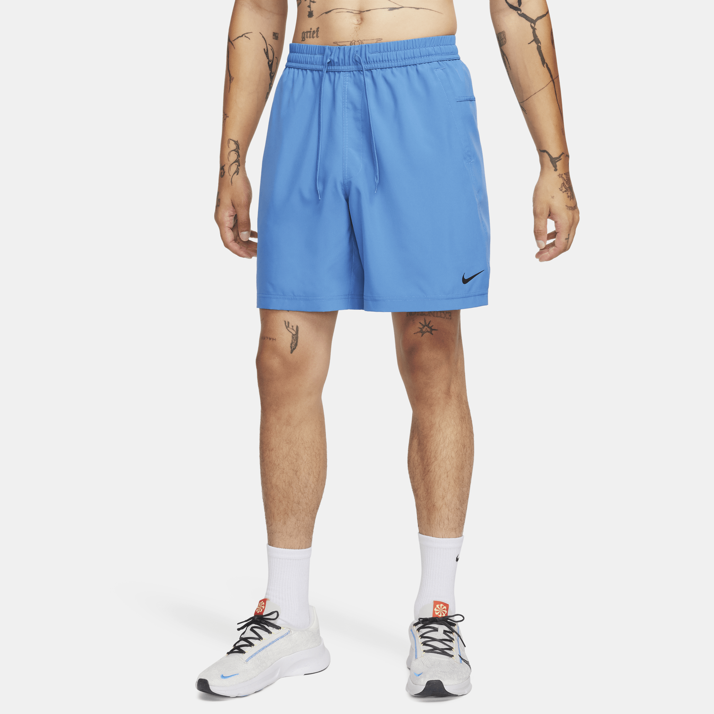 Shop Nike Men's Form Dri-fit 7" Unlined Versatile Shorts In Blue