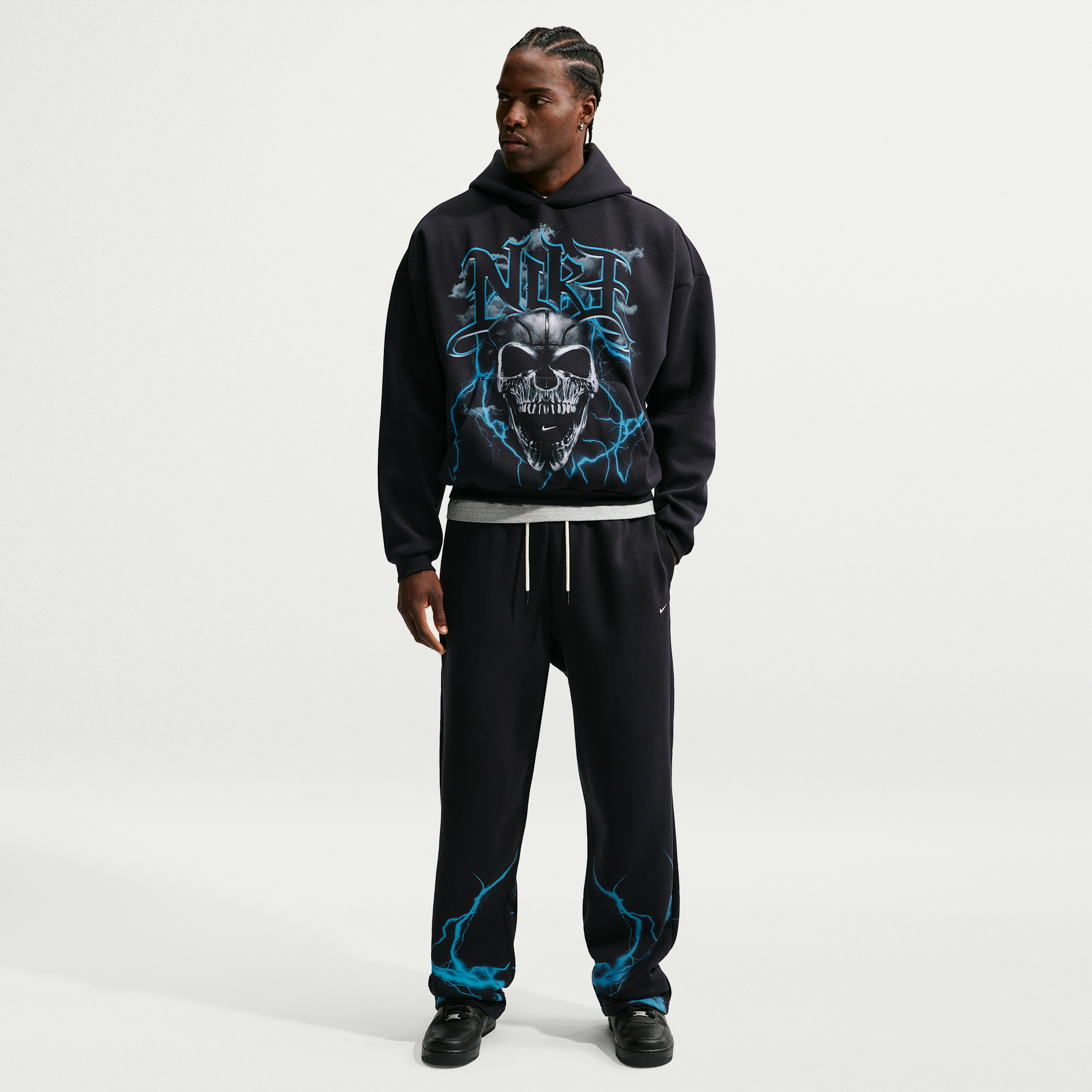 Nike Men's Standard Issue Brushed Skull Basketball Pants in Black/Light Current Blue/Pale Ivory Size: 4XL