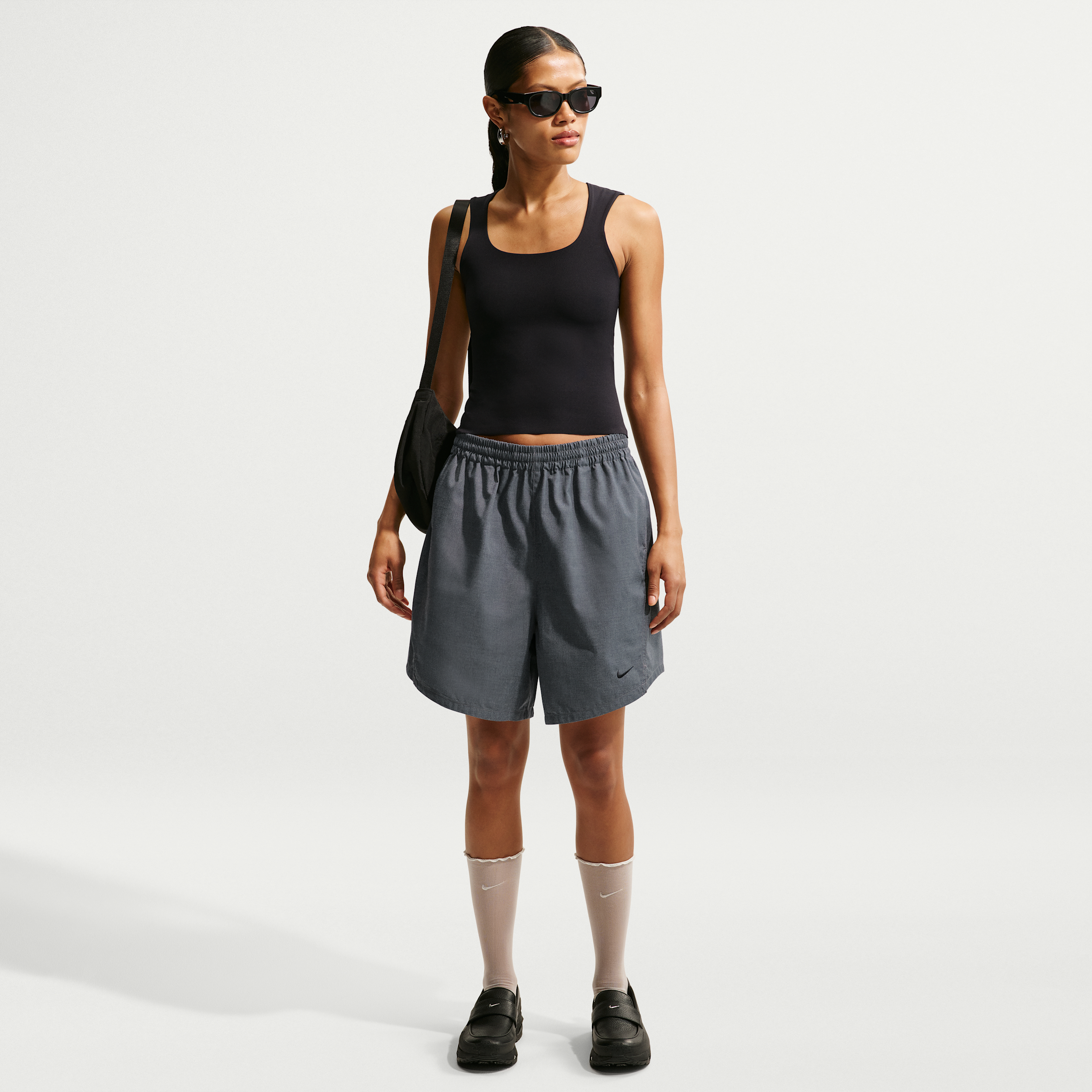 Women's Nike Sportswear Oversized Mid-Rise Woven Shorts in Black | IF0554-010