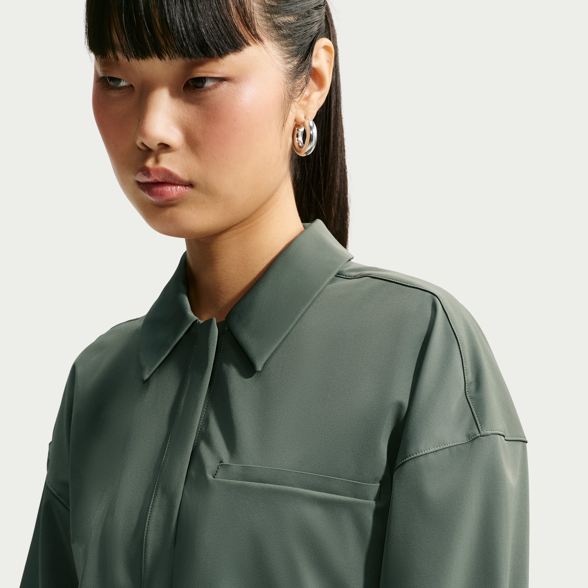 Nike Women's 24.7 PerfectStretch Dri-FIT UV Protection Cropped Long-Sleeve Shirt in Green | IR8703-303